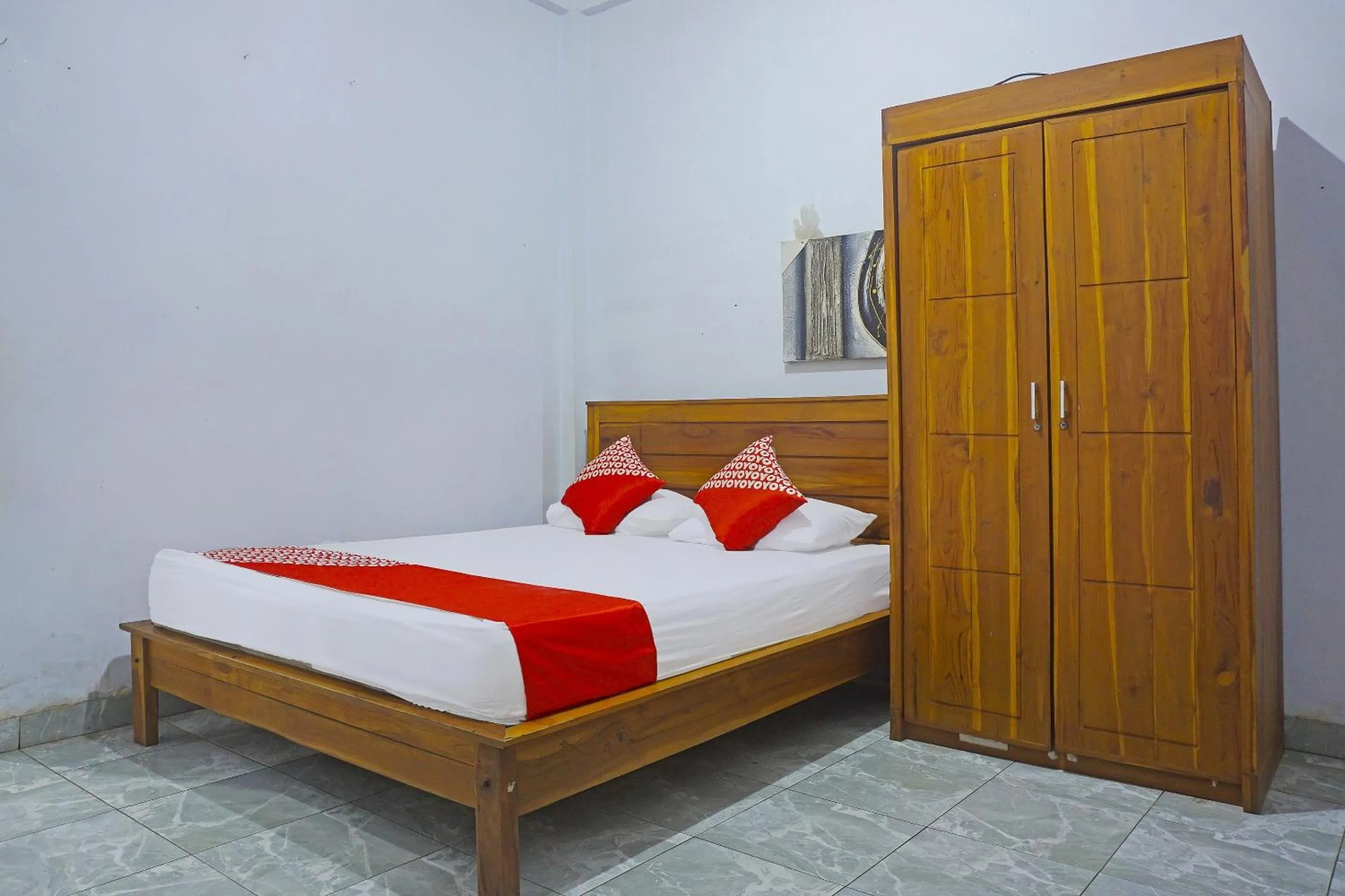 Bedroom, Bed in Hotel O Anggrek Homes Makassar