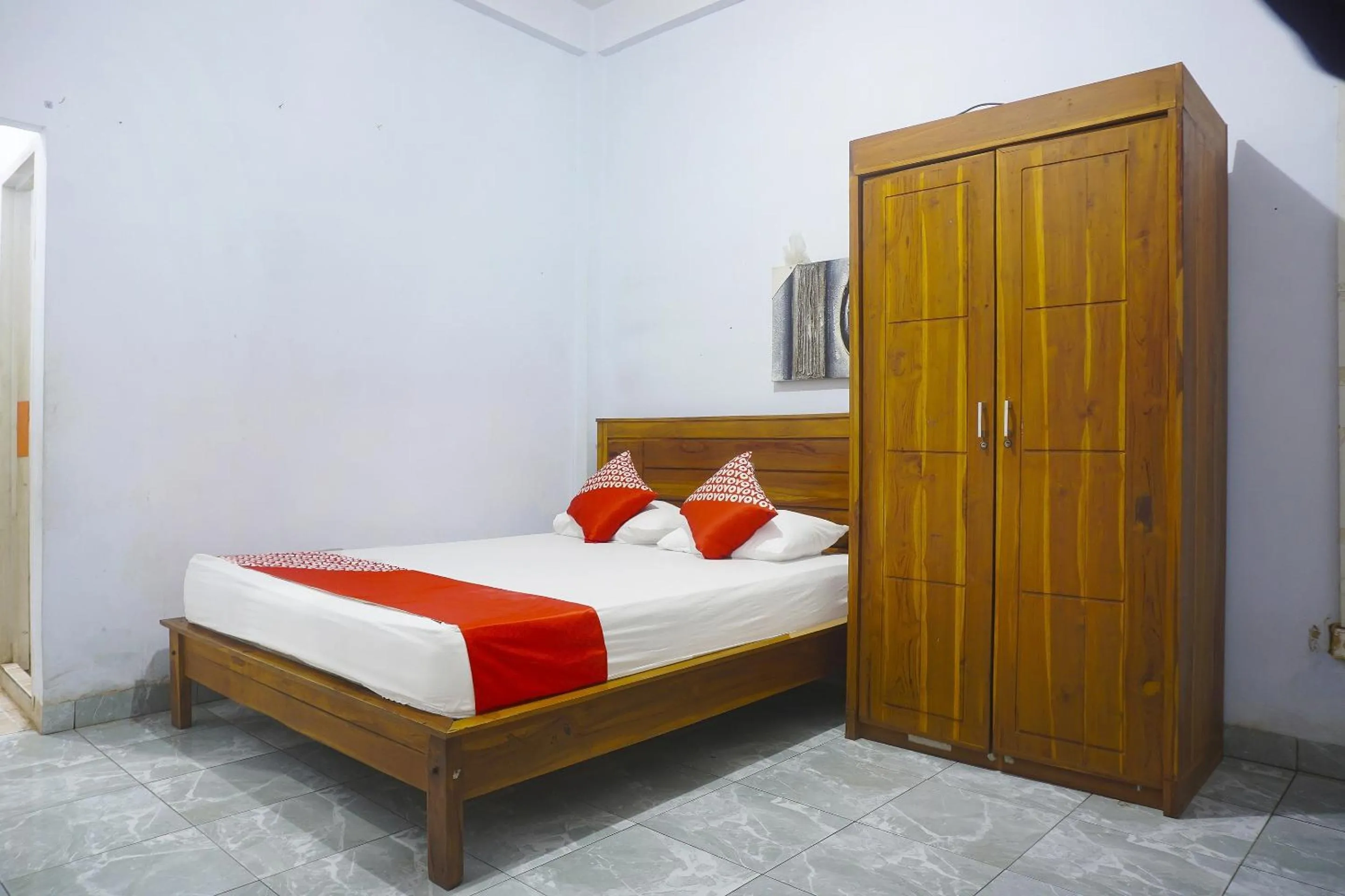 Bedroom, Bed in Hotel O Anggrek Homes Makassar
