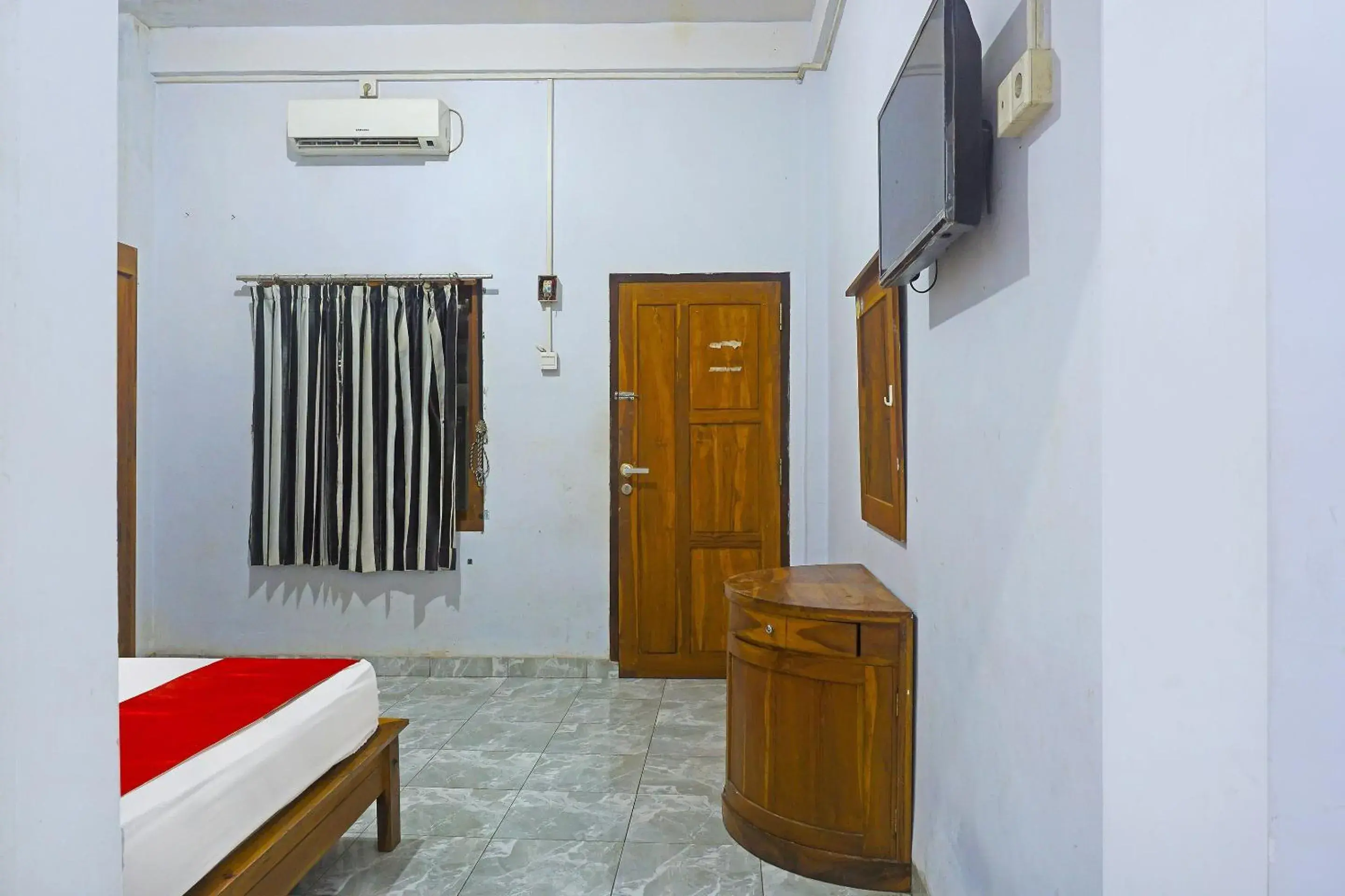 Bedroom, Bed in Hotel O Anggrek Homes Makassar Bedroom, Bed in Hotel O Anggrek Homes Makassar