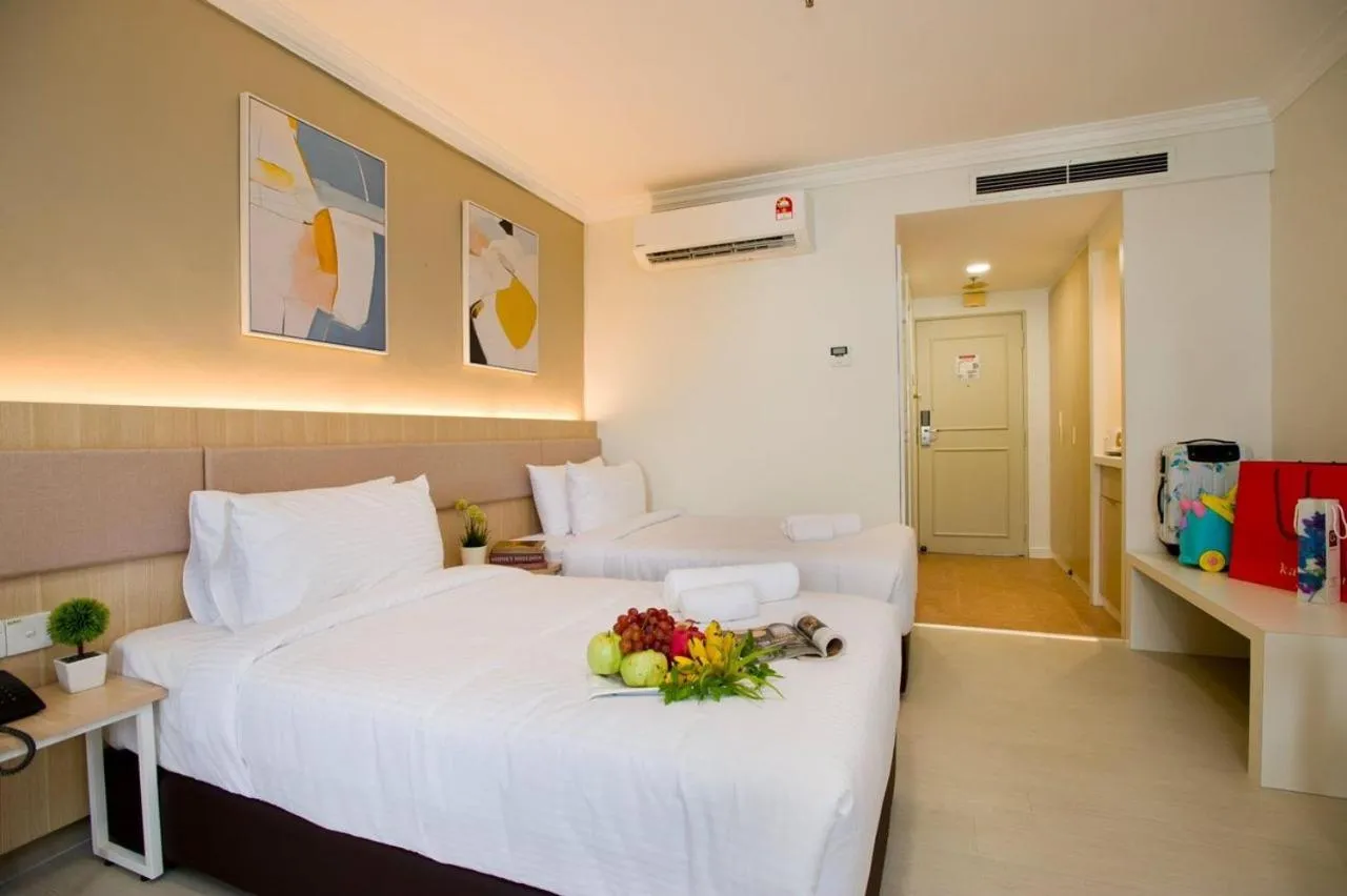 Bed in SWISS AVENUE HOTEL