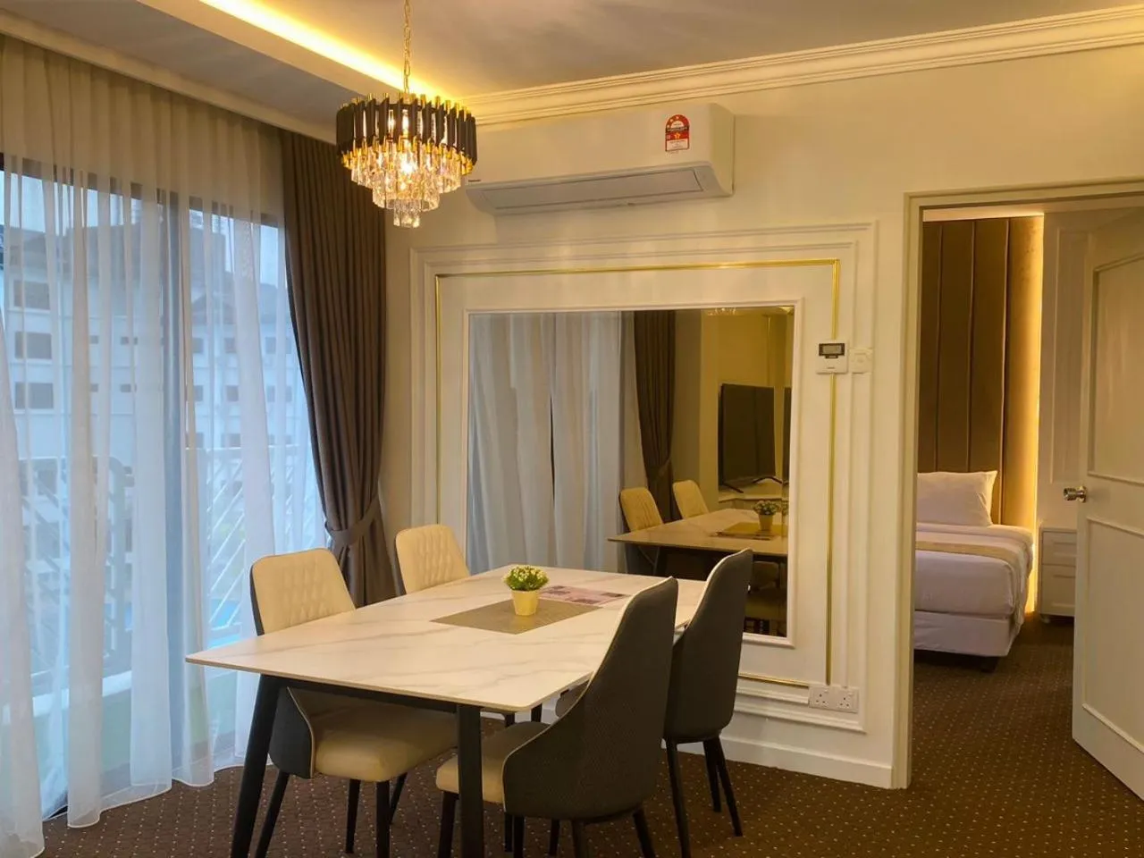 Bed in SWISS AVENUE HOTEL