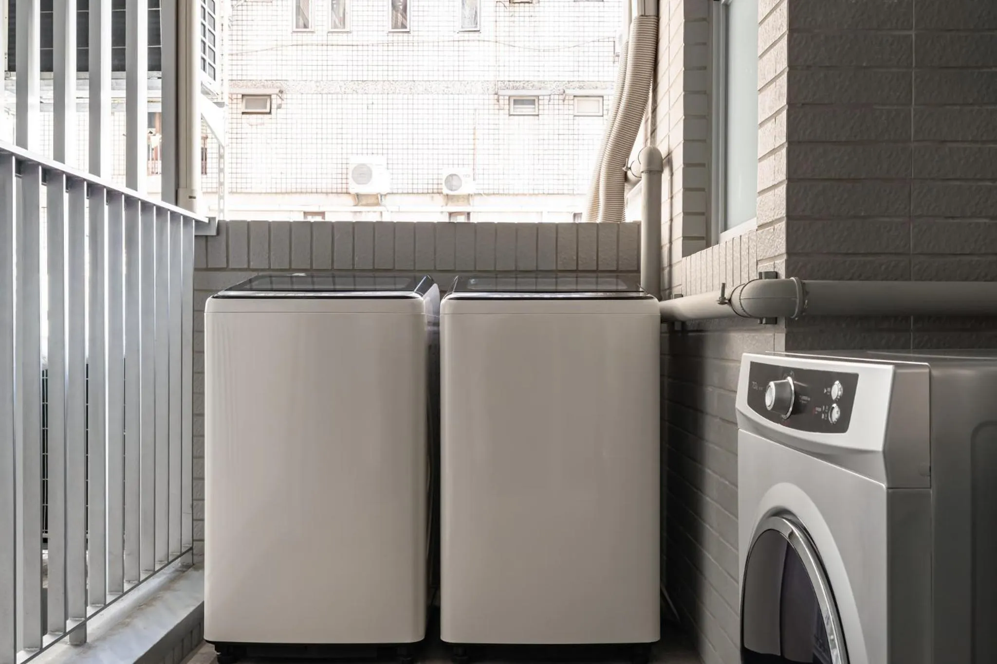 washing machine in 1LI7E Hotel