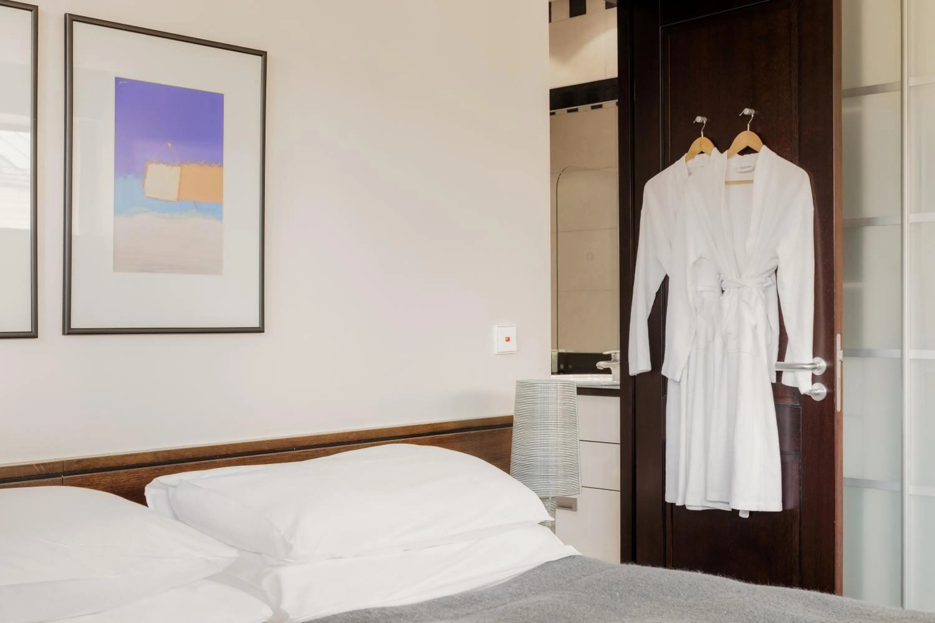 Bed in Hotel Bergs Suites