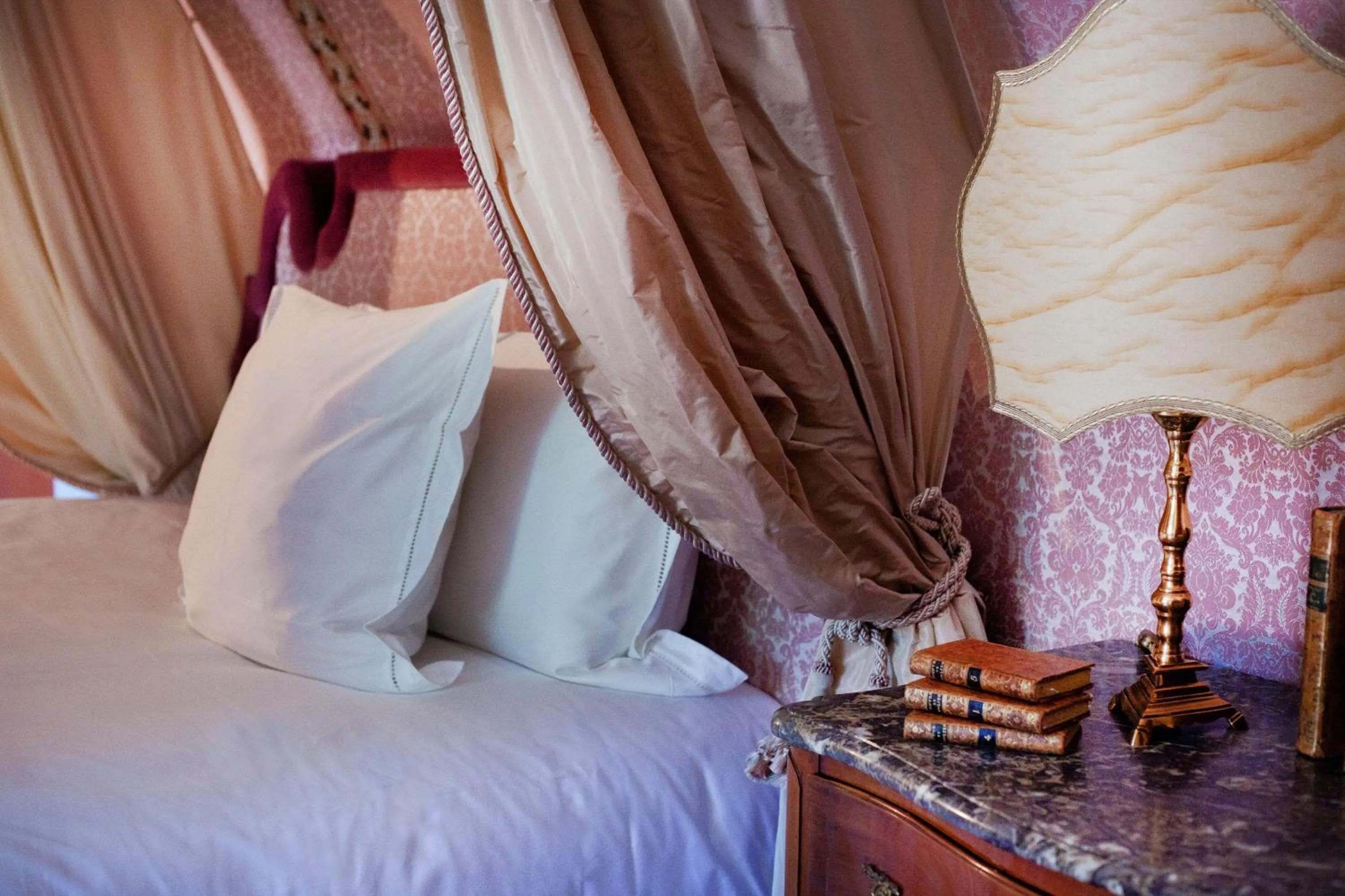 Bed in Relais & Château Louise de La Vallière