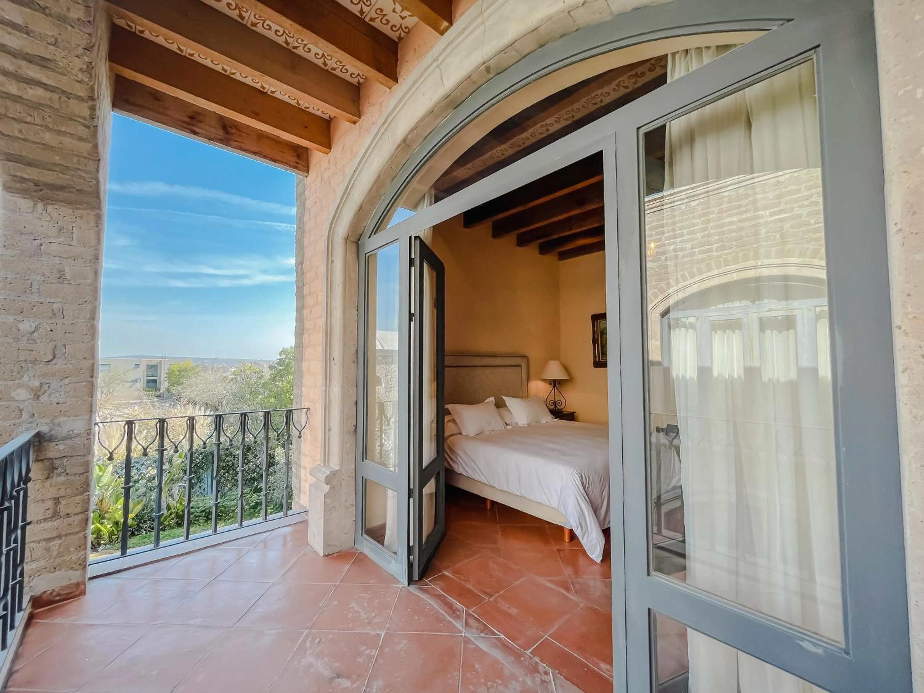Balcony/Terrace, Bed in Hacienda Los Arcangeles