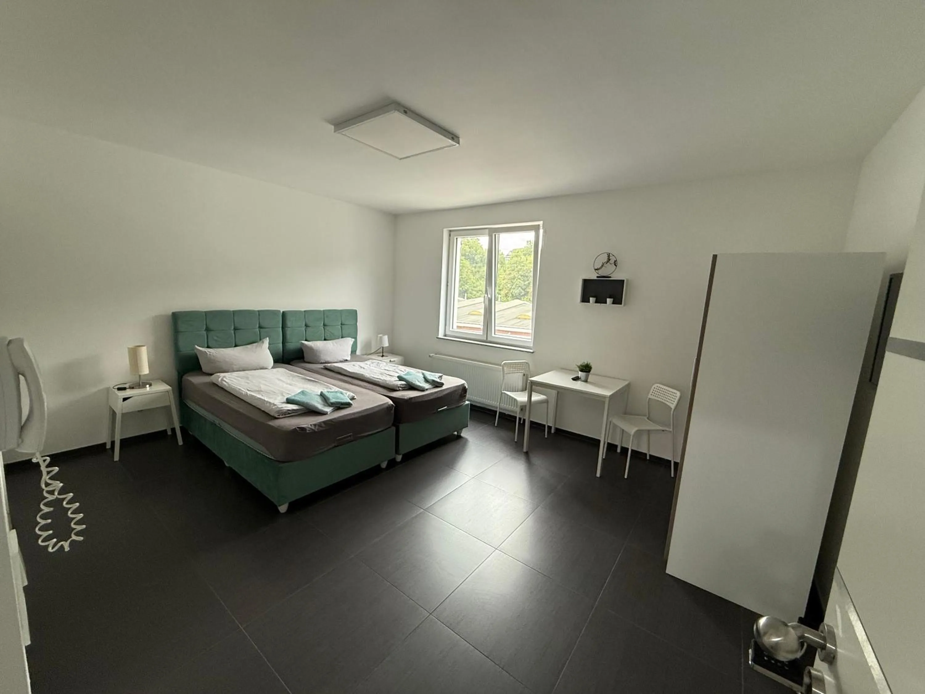 Photo of the whole room, Bed in Aparthotel Siegen