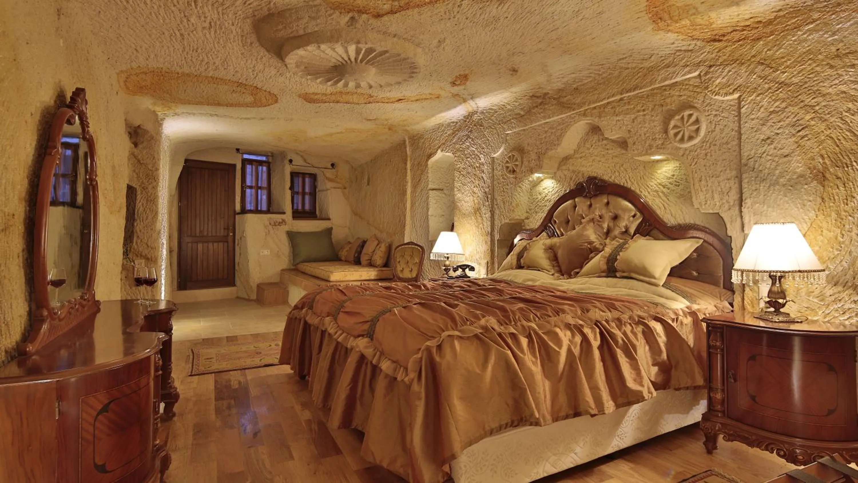 Photo of the whole room, Bed in Golden Cave Suites
