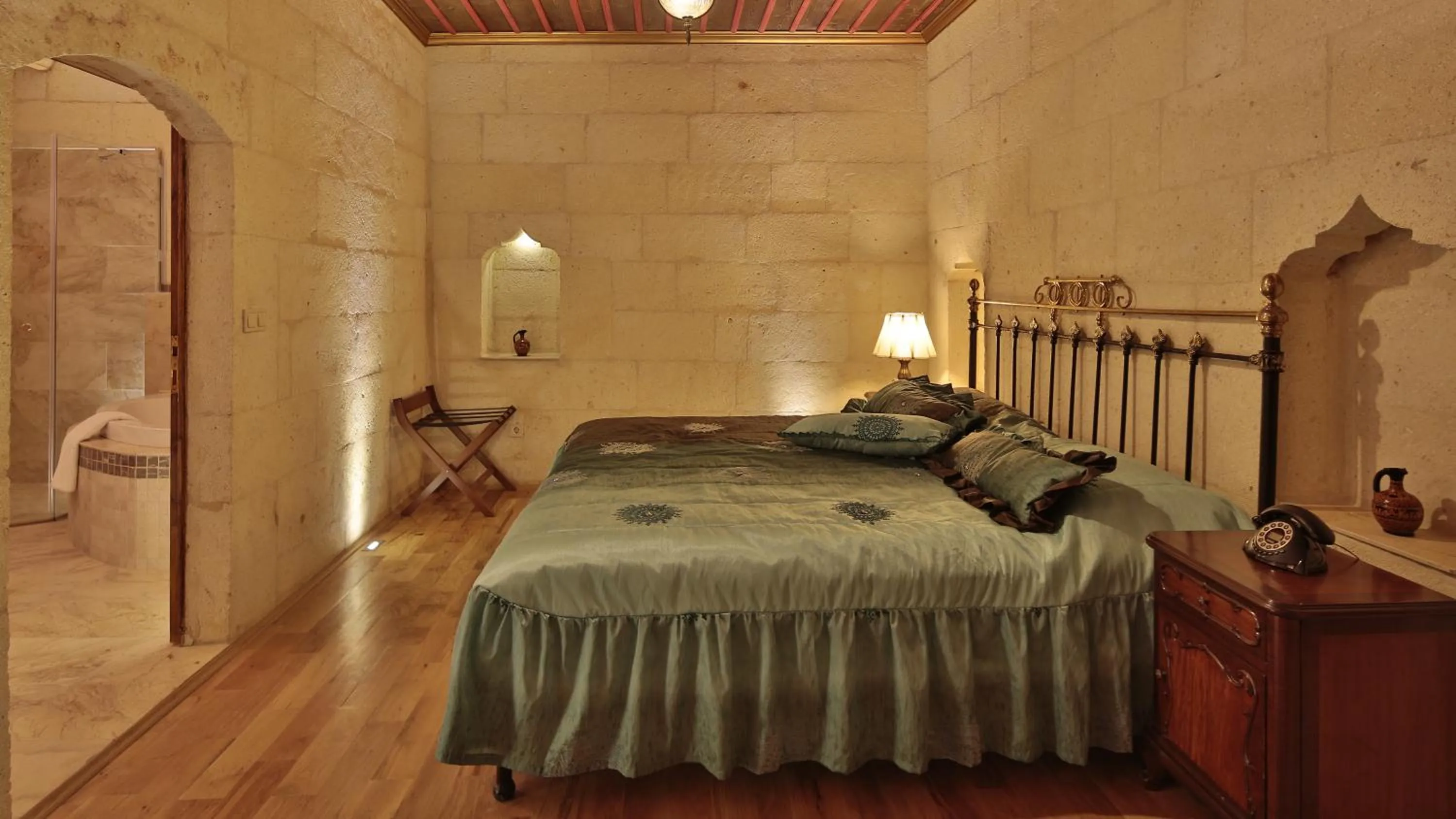 Bed in Golden Cave Suites