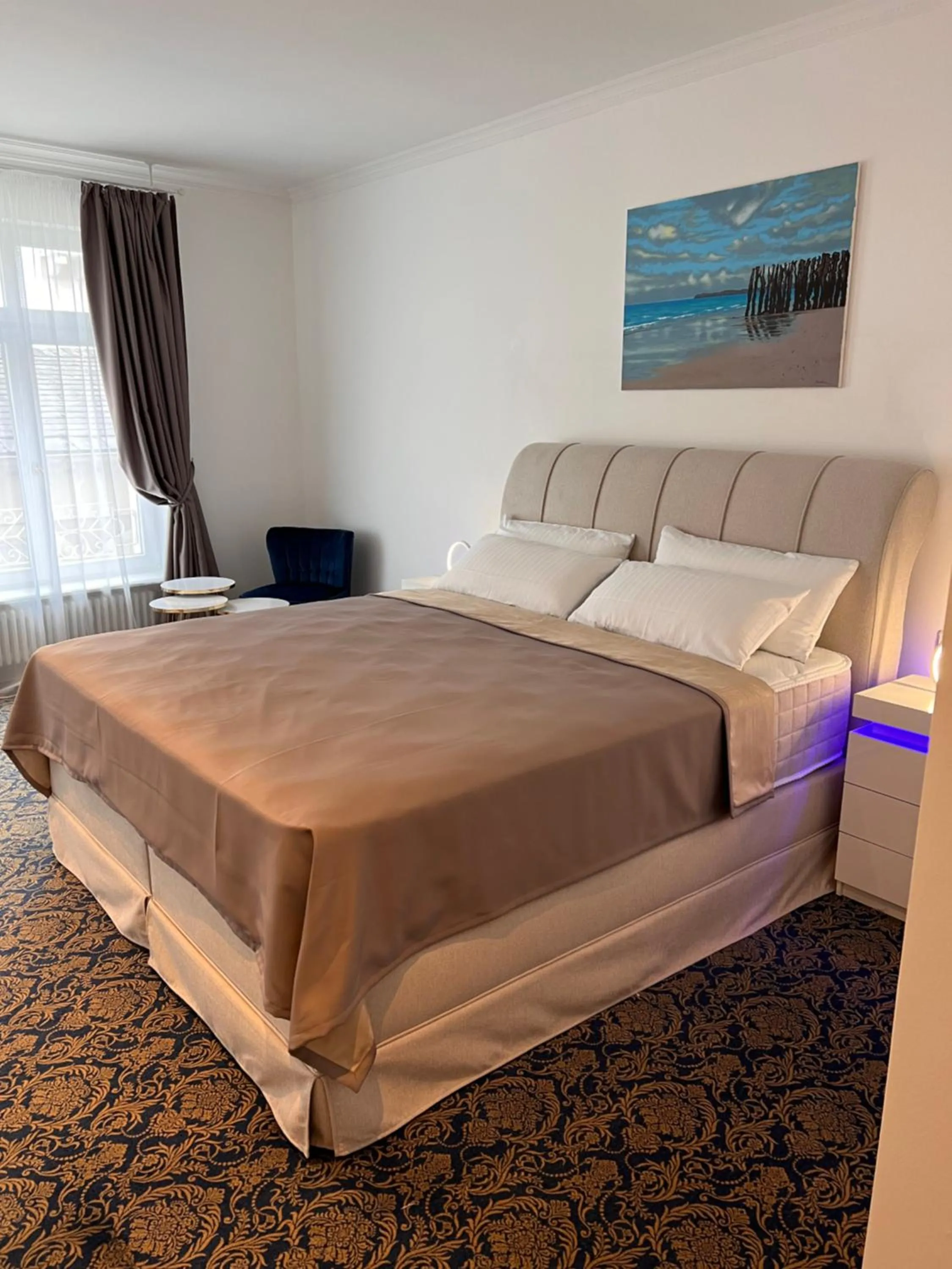 Bed in ART HOTEL HOUSE ONE