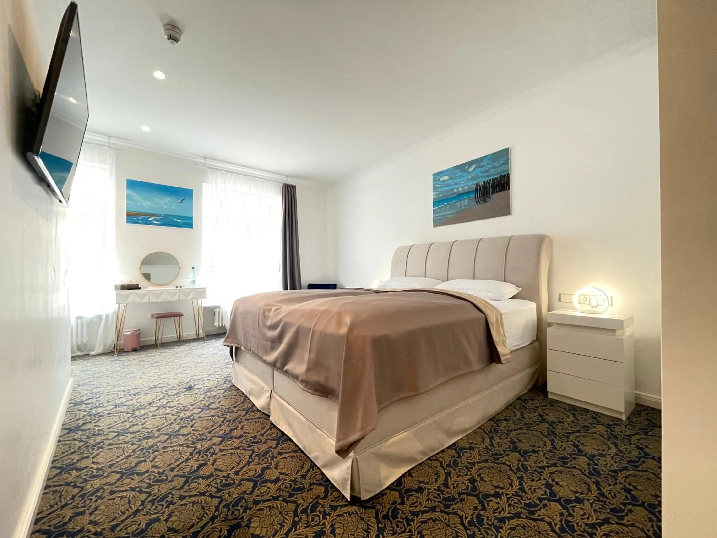 Bed in ART HOTEL HOUSE ONE