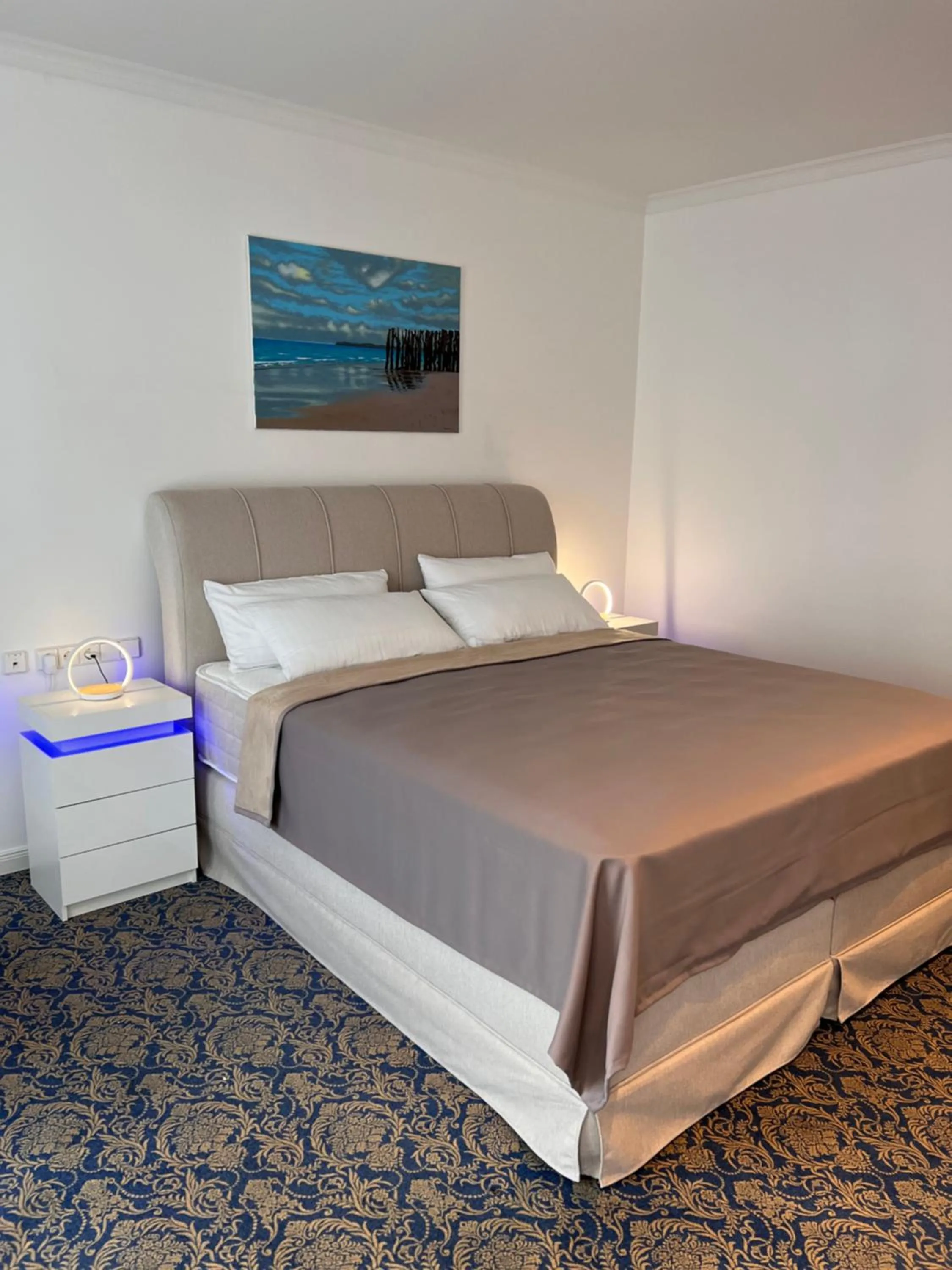 Bed in ART HOTEL HOUSE ONE