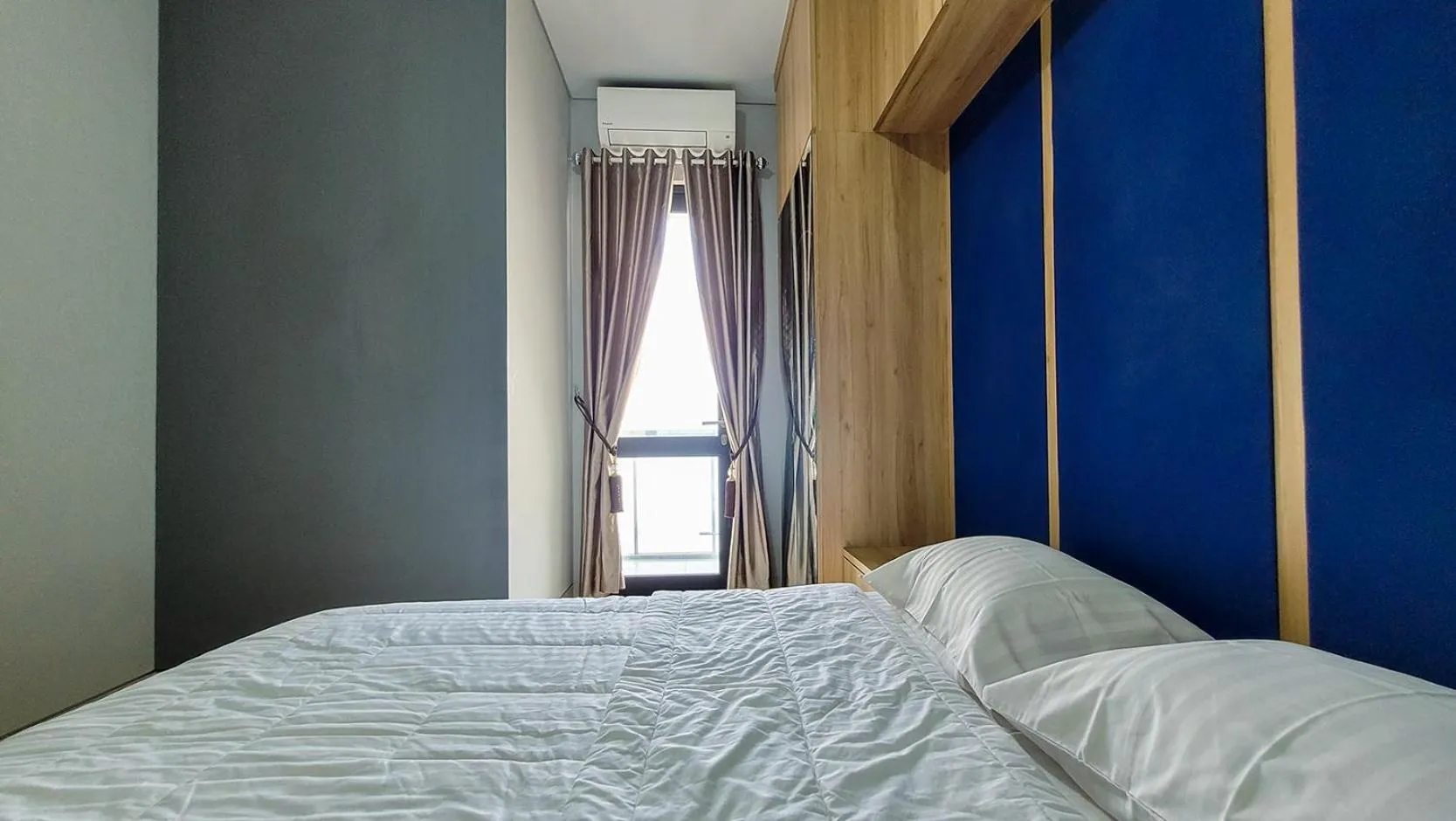 Bed in Palam Mansion at Apartment One Residence