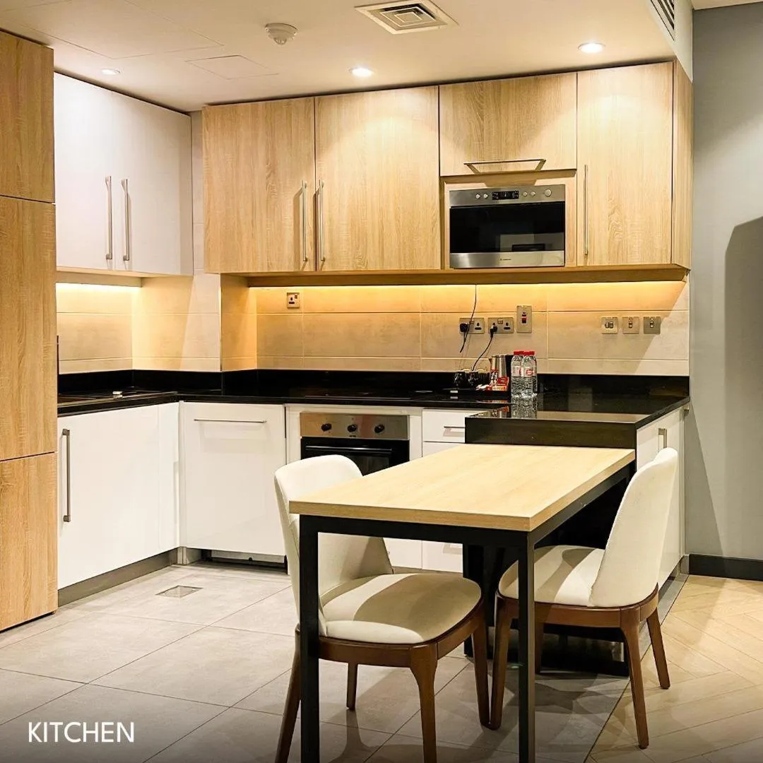 Kitchen or kitchenette in Royal Mansoura Residence Hotel