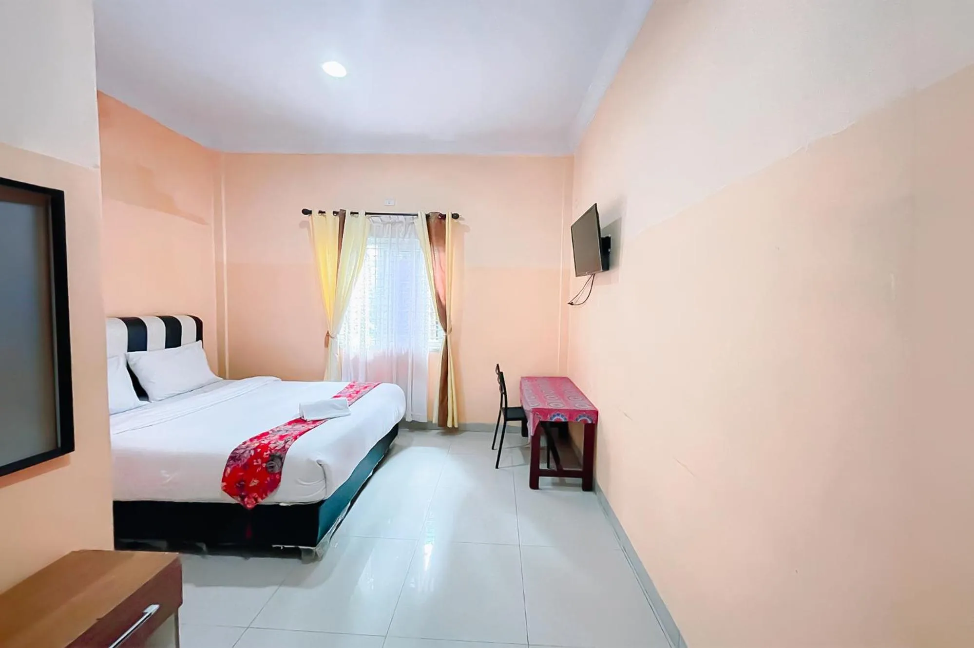 Bed in Hotel New Dieng By Helocus