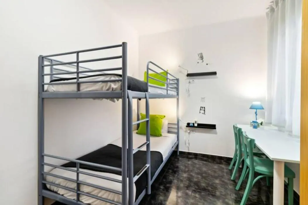 Bedroom, Bed in Stay U-nique Apartments La Bordeta