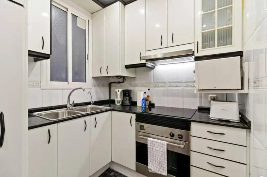Kitchen or kitchenette in Stay U-nique Apartments La Bordeta