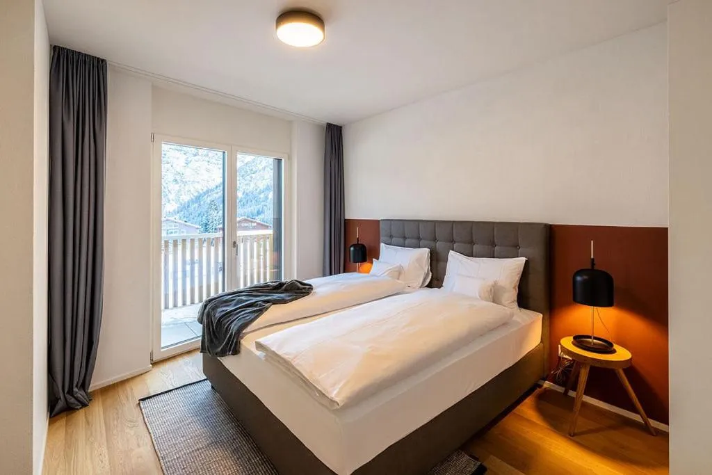Bed in AVES Hotel&Apartment Arosa