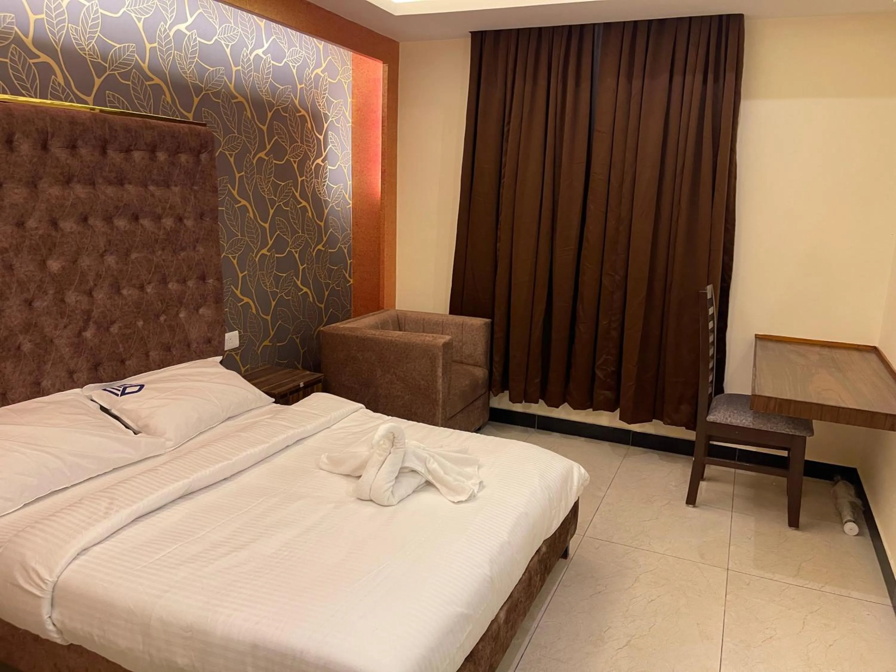 Bed in MMD Grande A Boutique Hotel