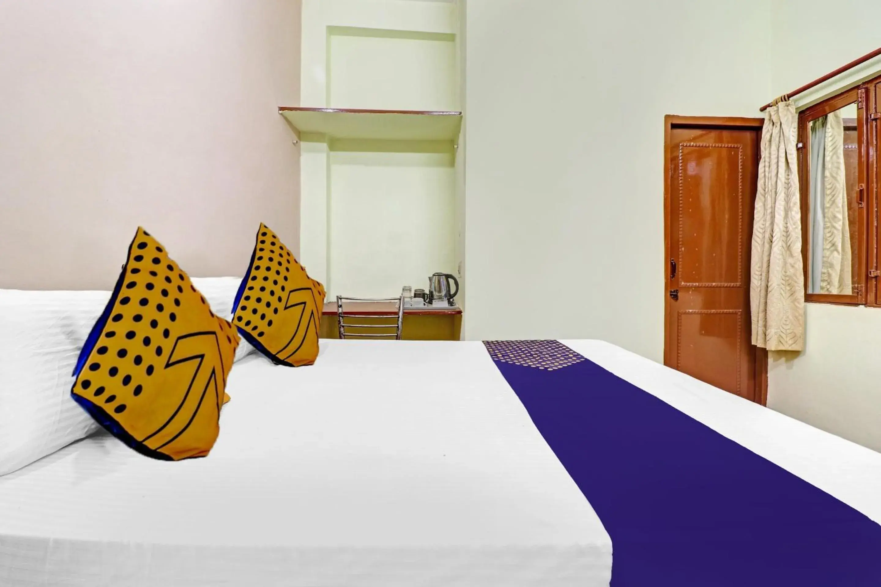 Bedroom, Bed in SPOT ON Ganpati Home Stays Bedroom, Bed in SPOT ON Ganpati Home Stays