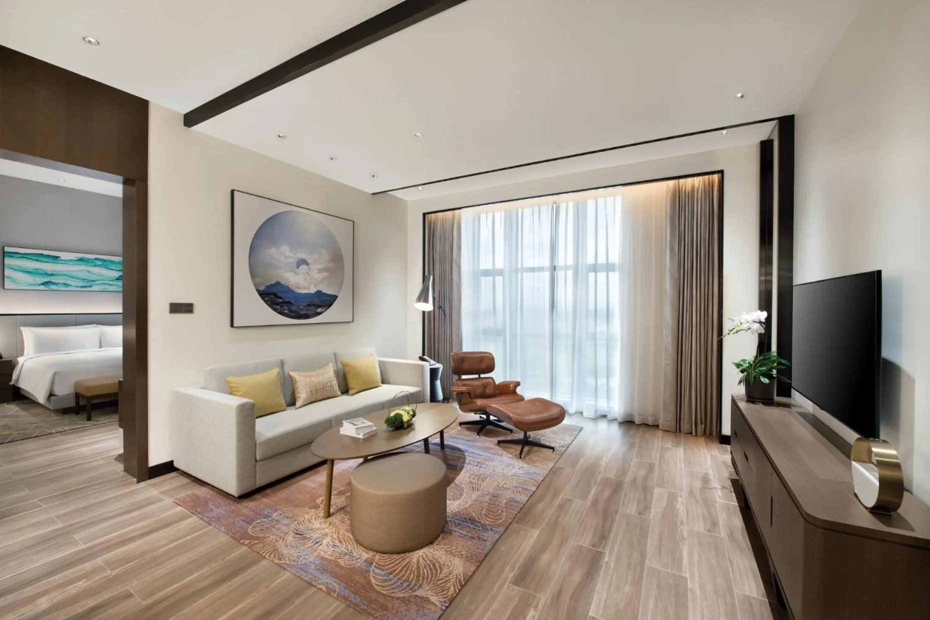 Living room, Bed in Oakwood Residence Foshan