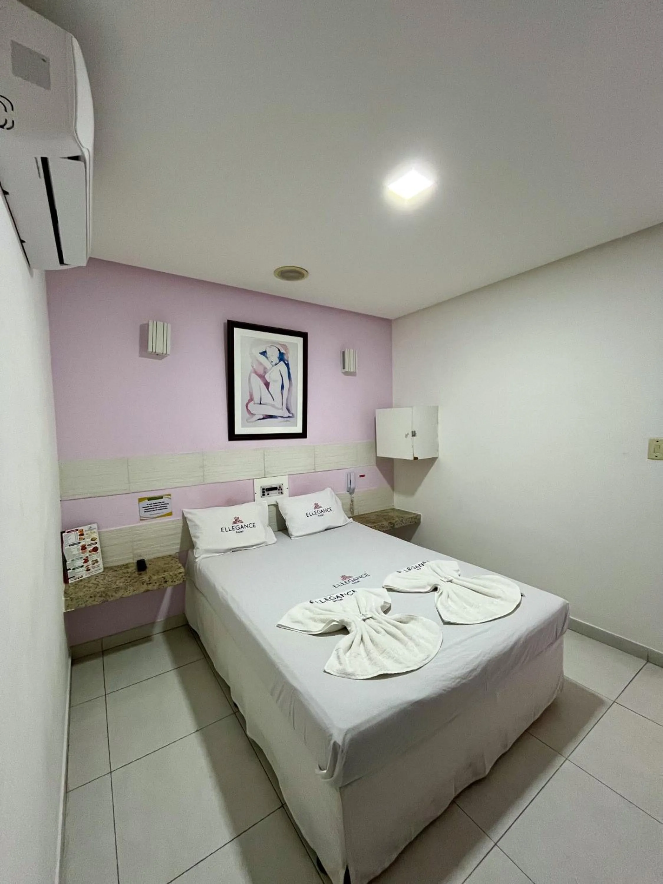 Bed in Hotel Ellegance