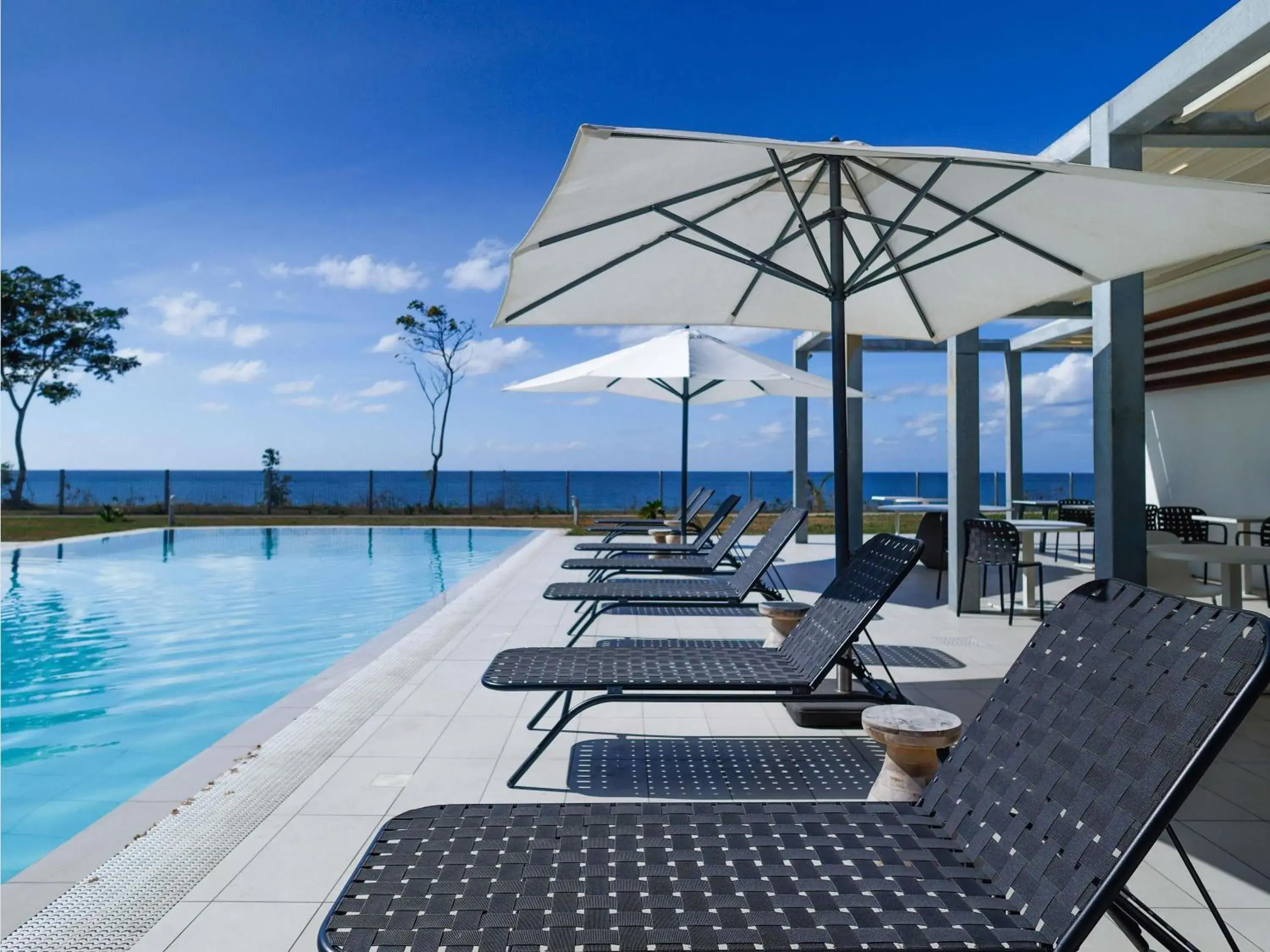 Pool view in Ibis Styles Mayotte Aéroport Pool view in Ibis Styles Mayotte Aéroport