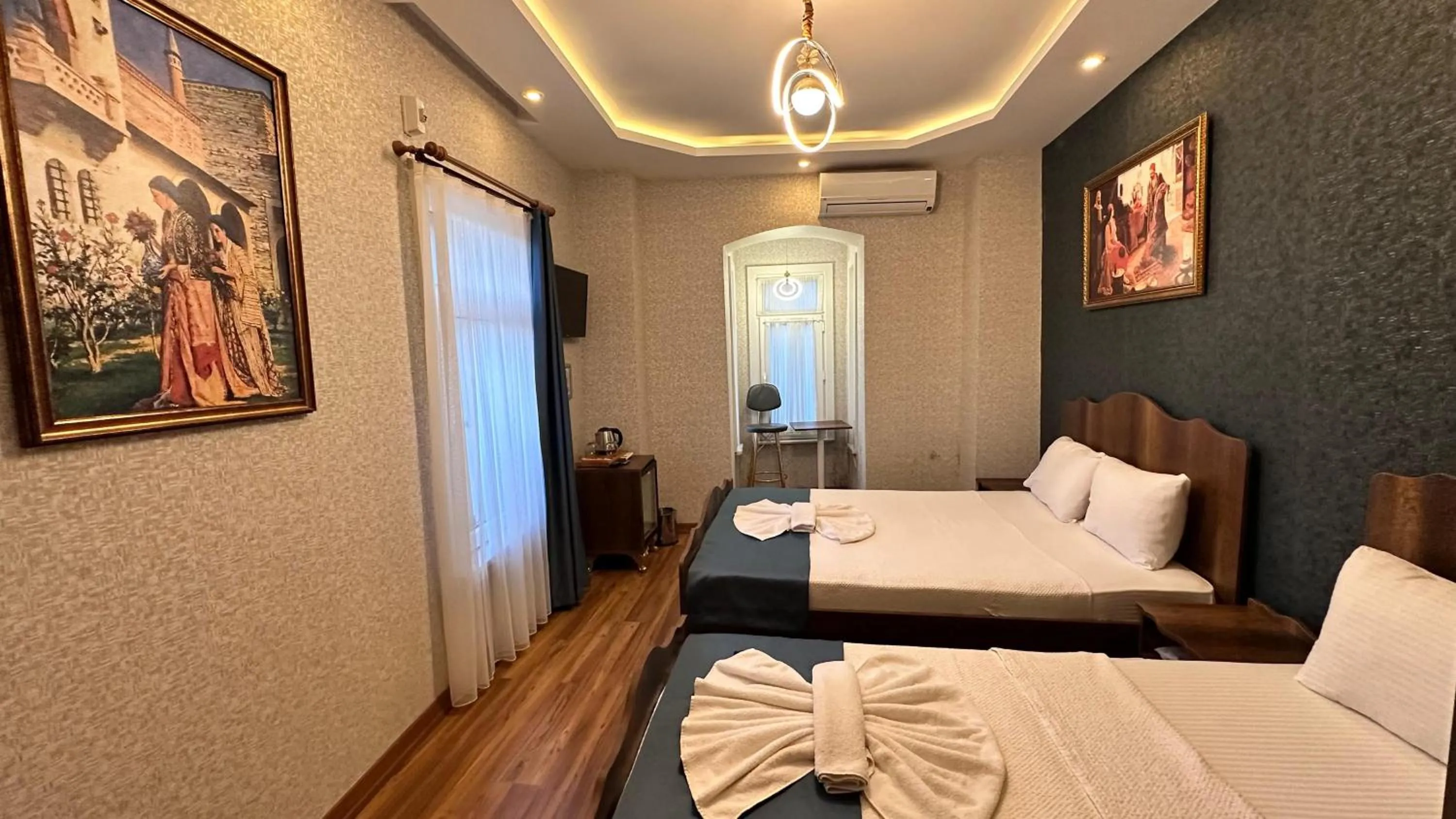 Bed in Aras Boutique Hotel & Suites