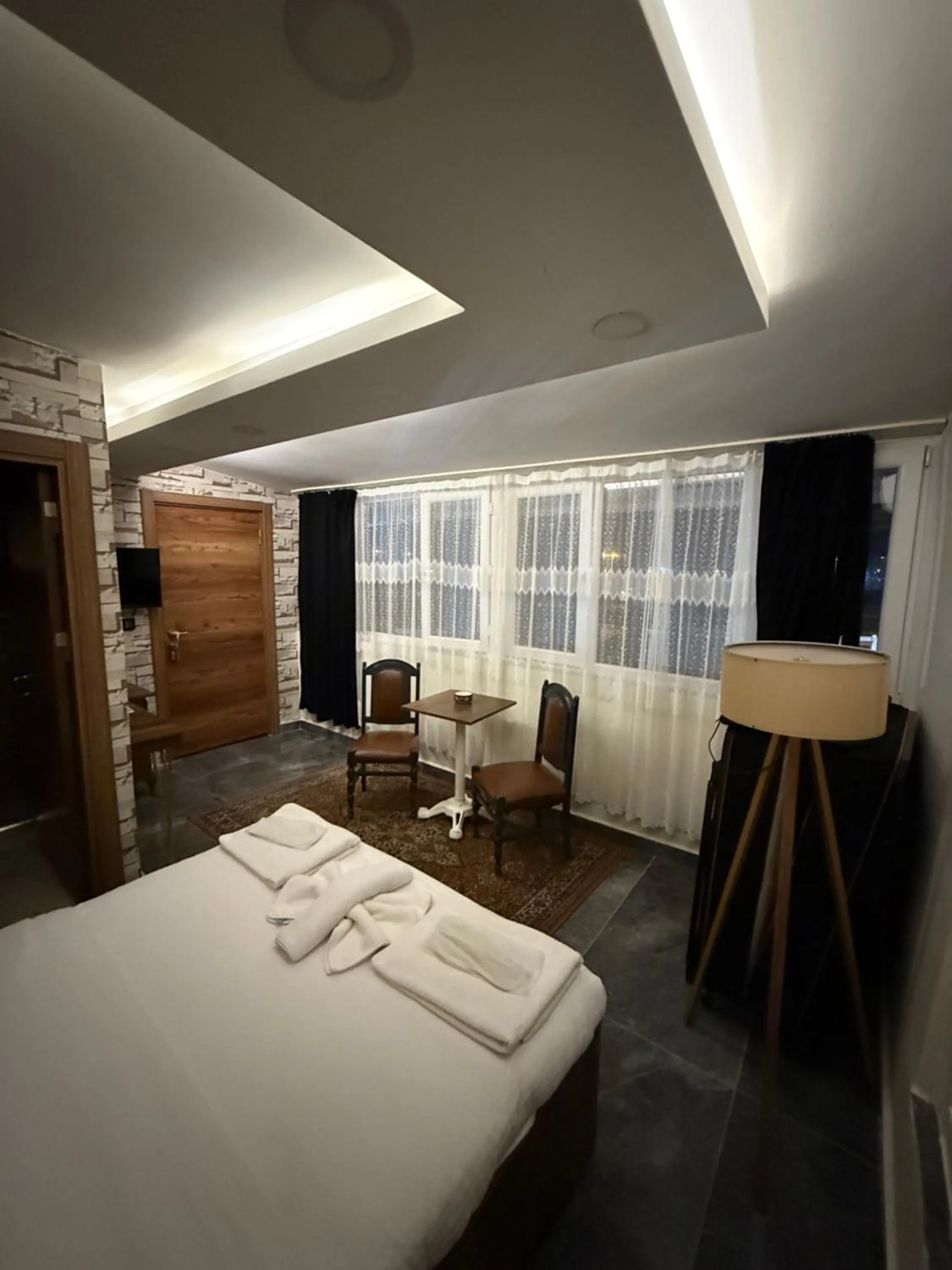 Bed in Aras Boutique Hotel & Suites