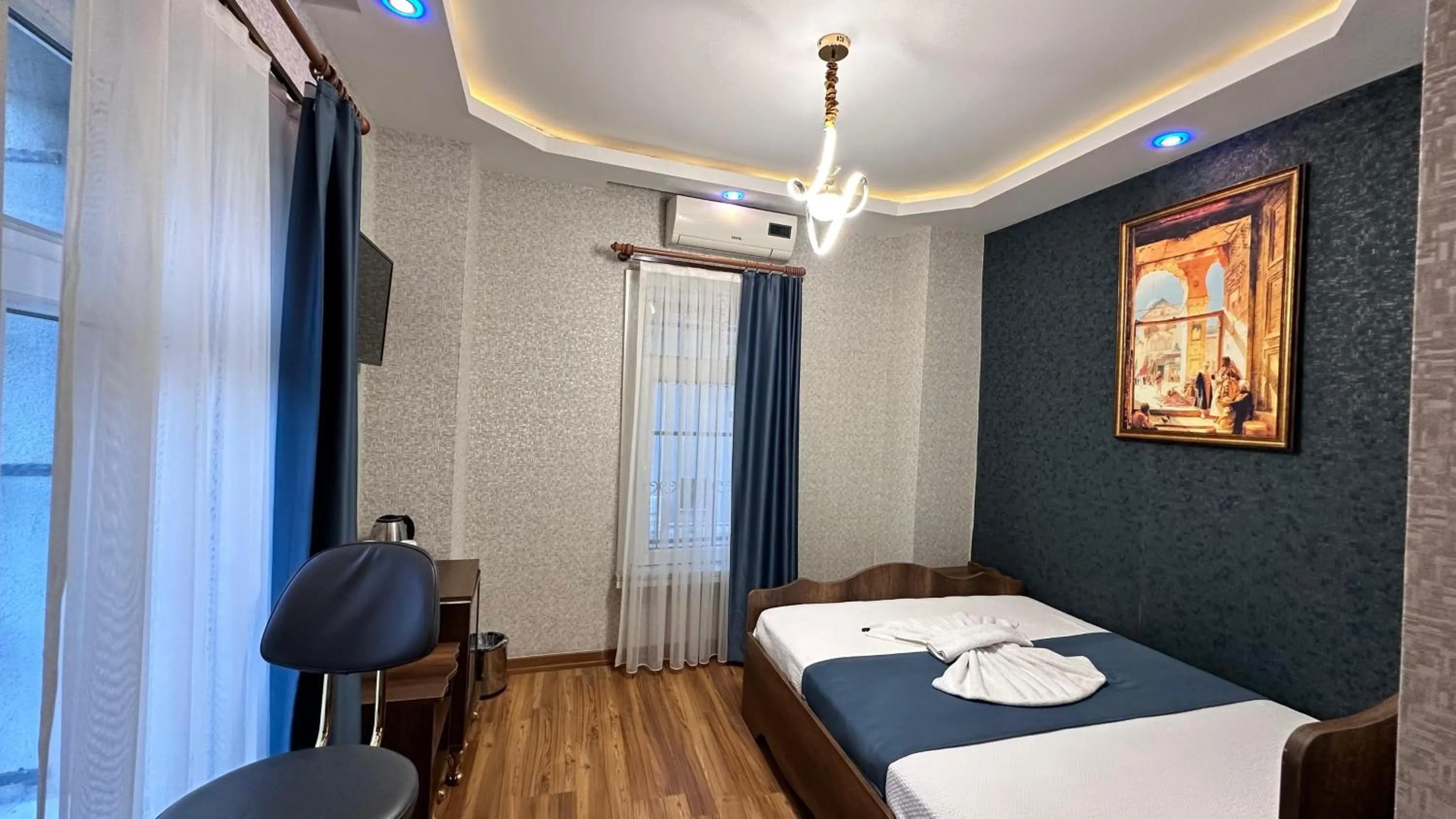 Bed in Aras Boutique Hotel & Suites