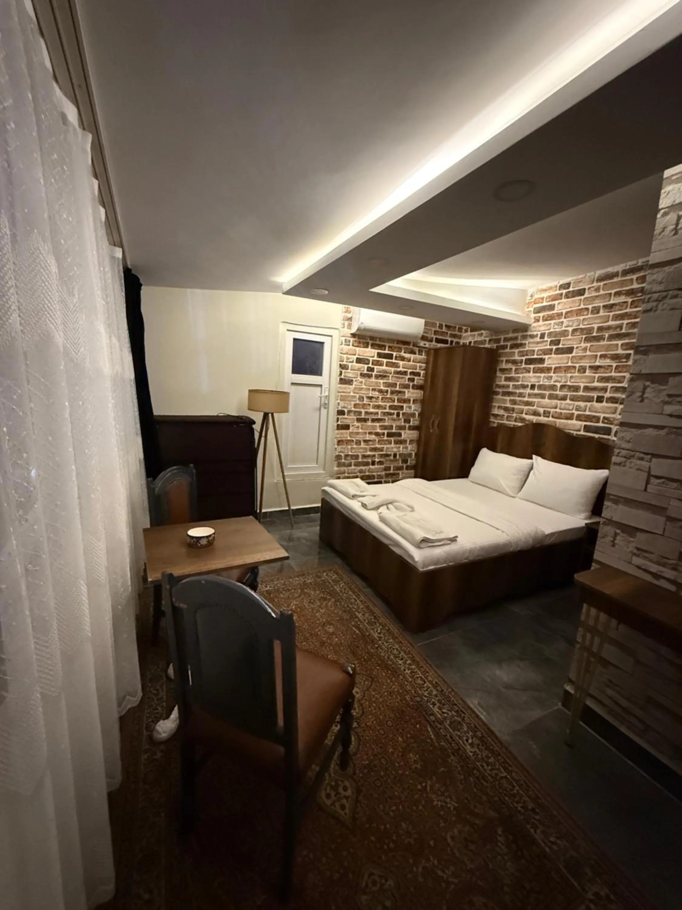 Bed in Aras Boutique Hotel & Suites