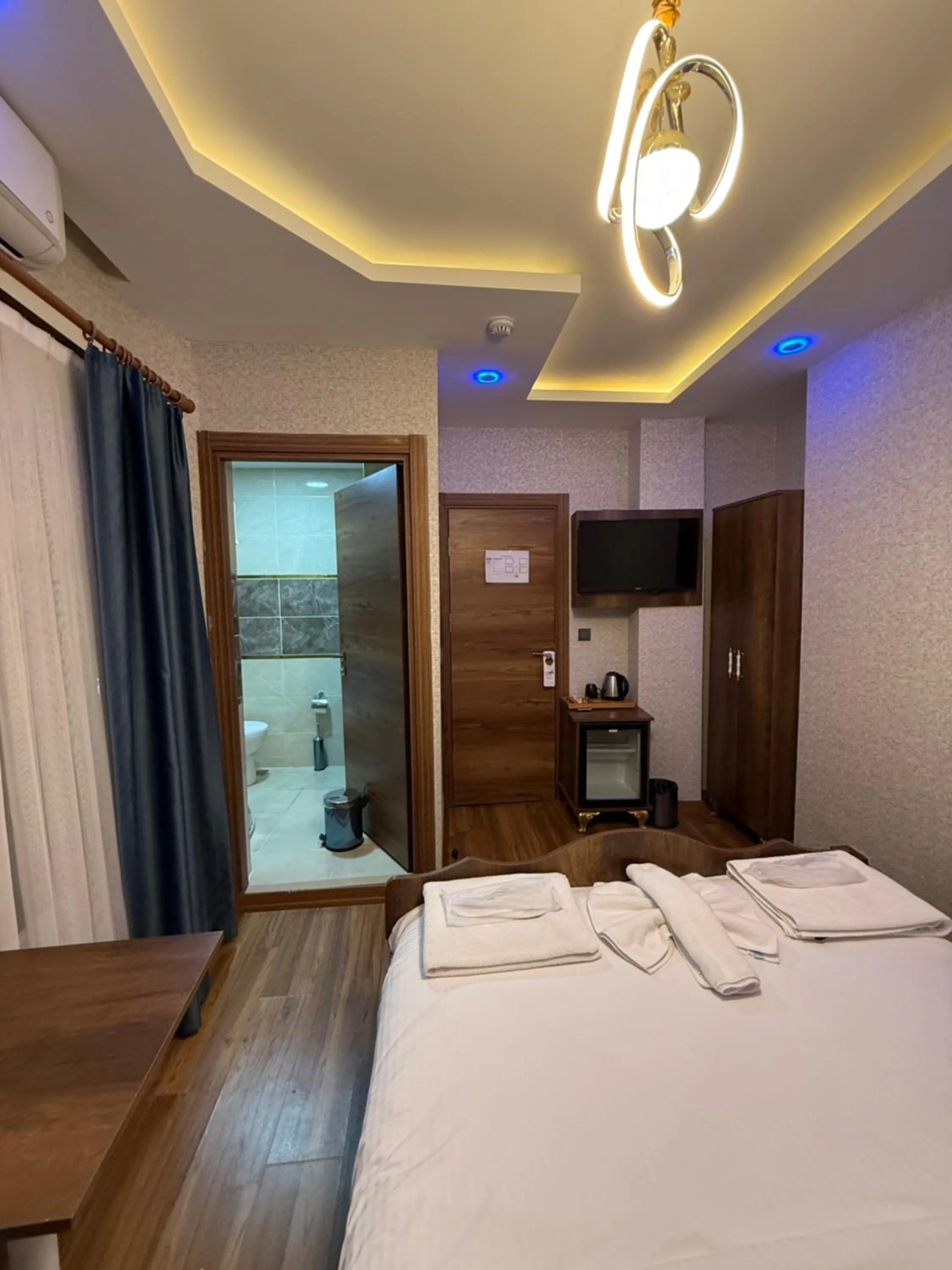 Bed in Aras Boutique Hotel & Suites