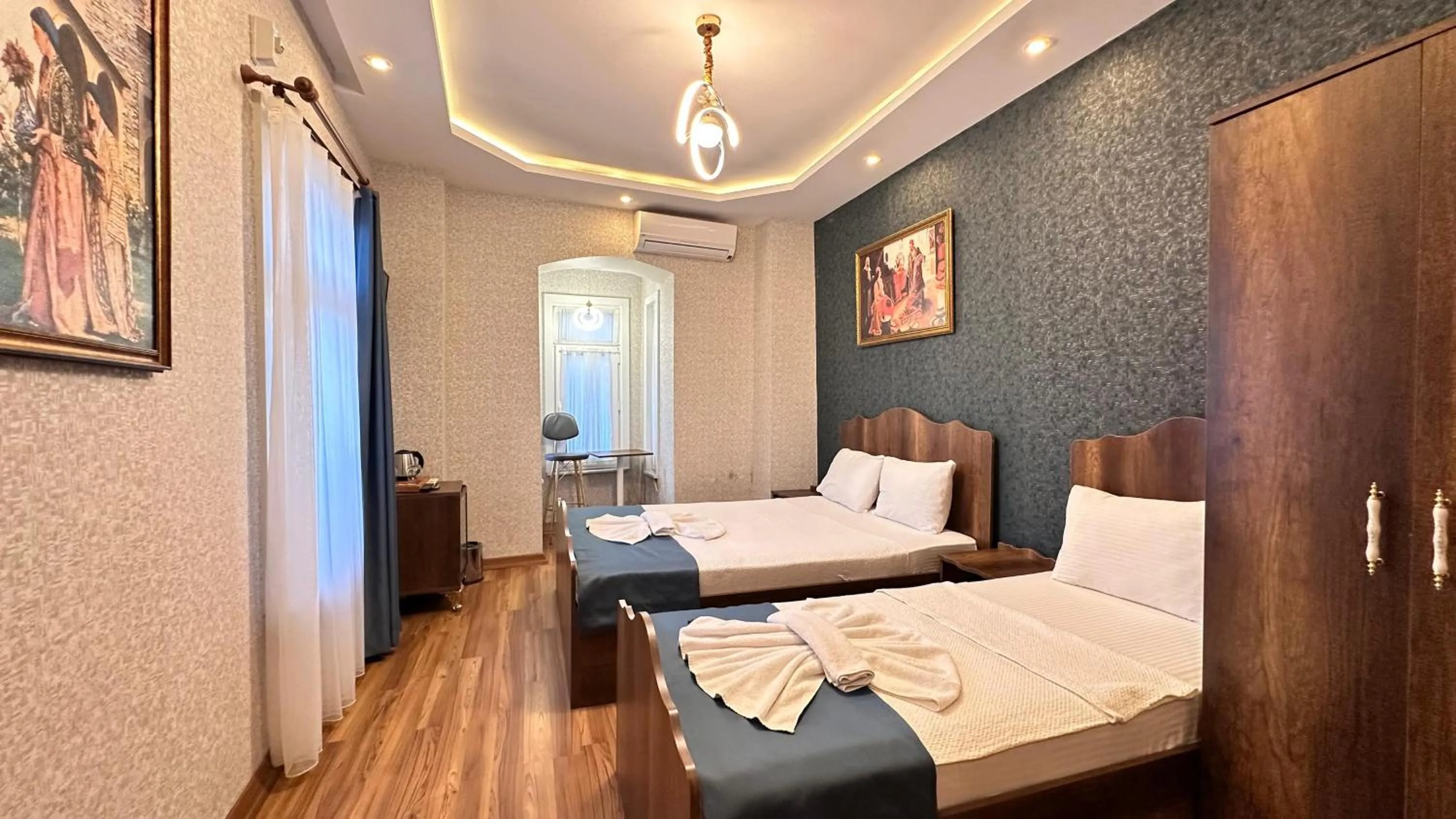 Bed in Aras Boutique Hotel & Suites