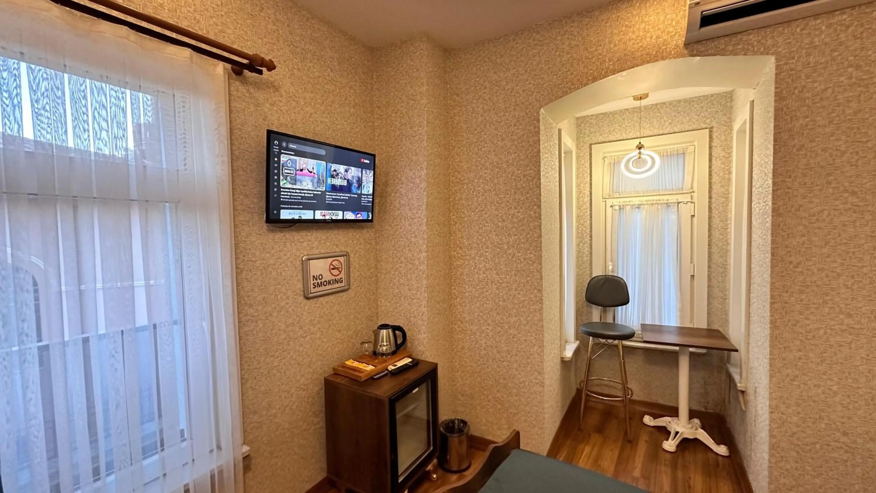 TV and multimedia in Aras Boutique Hotel & Suites