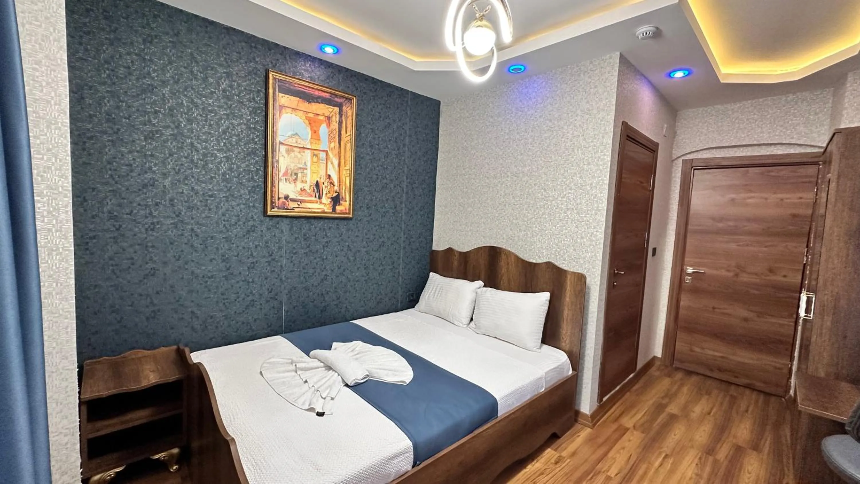 Bed in Aras Boutique Hotel & Suites