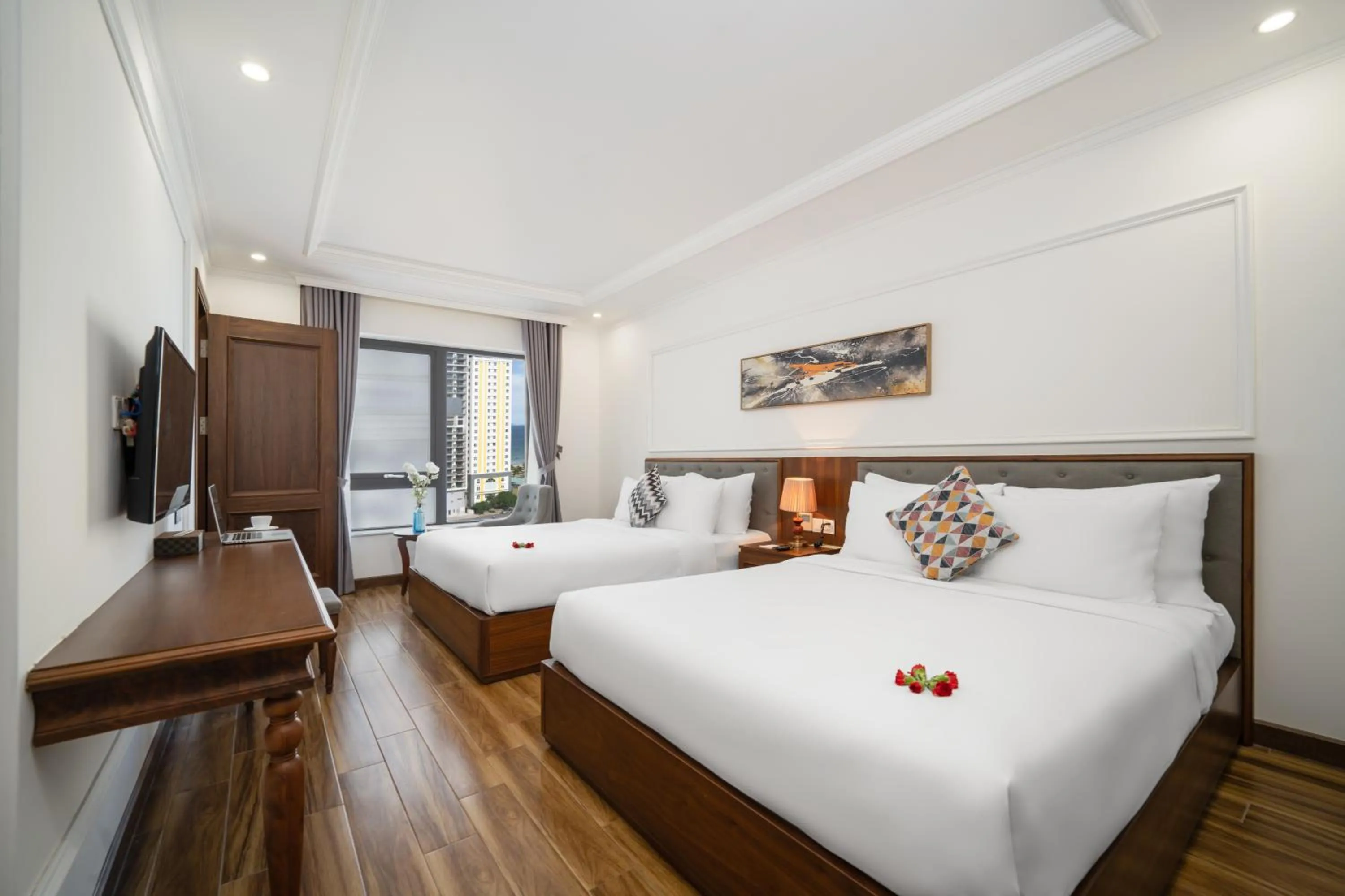 Photo of the whole room, Bed in The Sail Hotel - My Khe Beach