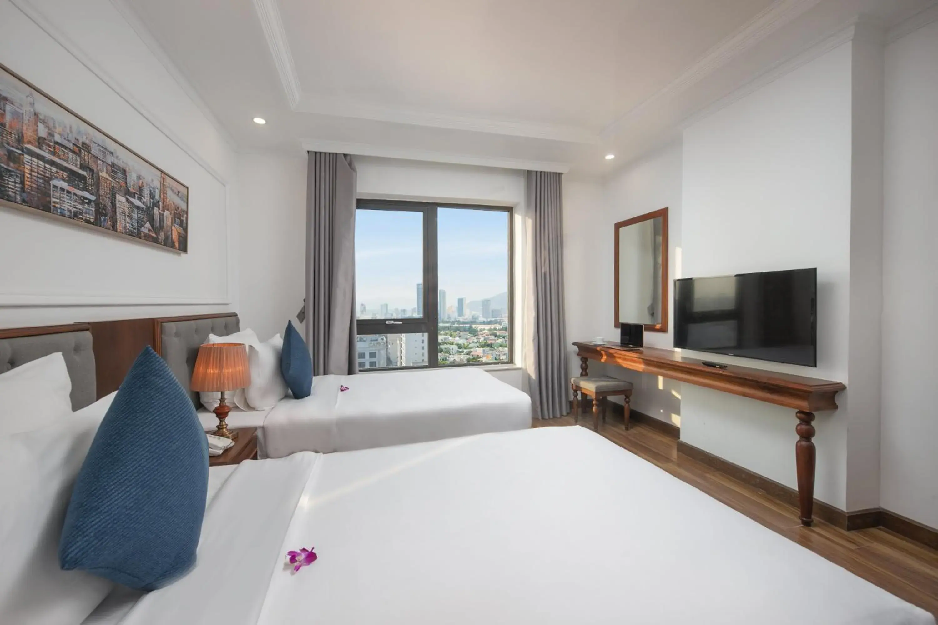 Photo of the whole room, Bed in The Sail Hotel - My Khe Beach Photo of the whole room, Bed in The Sail Hotel - My Khe Beach