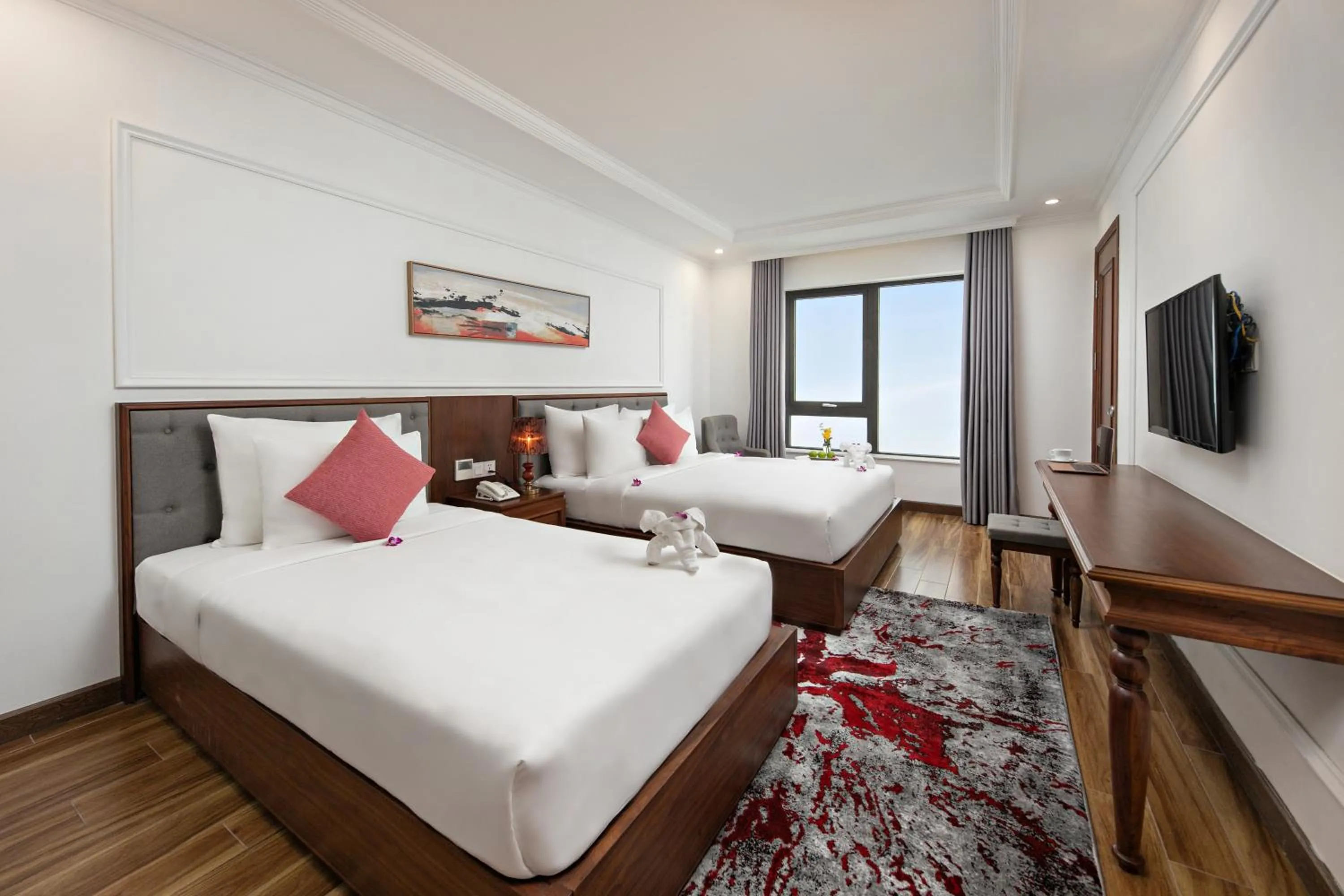 Photo of the whole room, Bed in The Sail Hotel - My Khe Beach