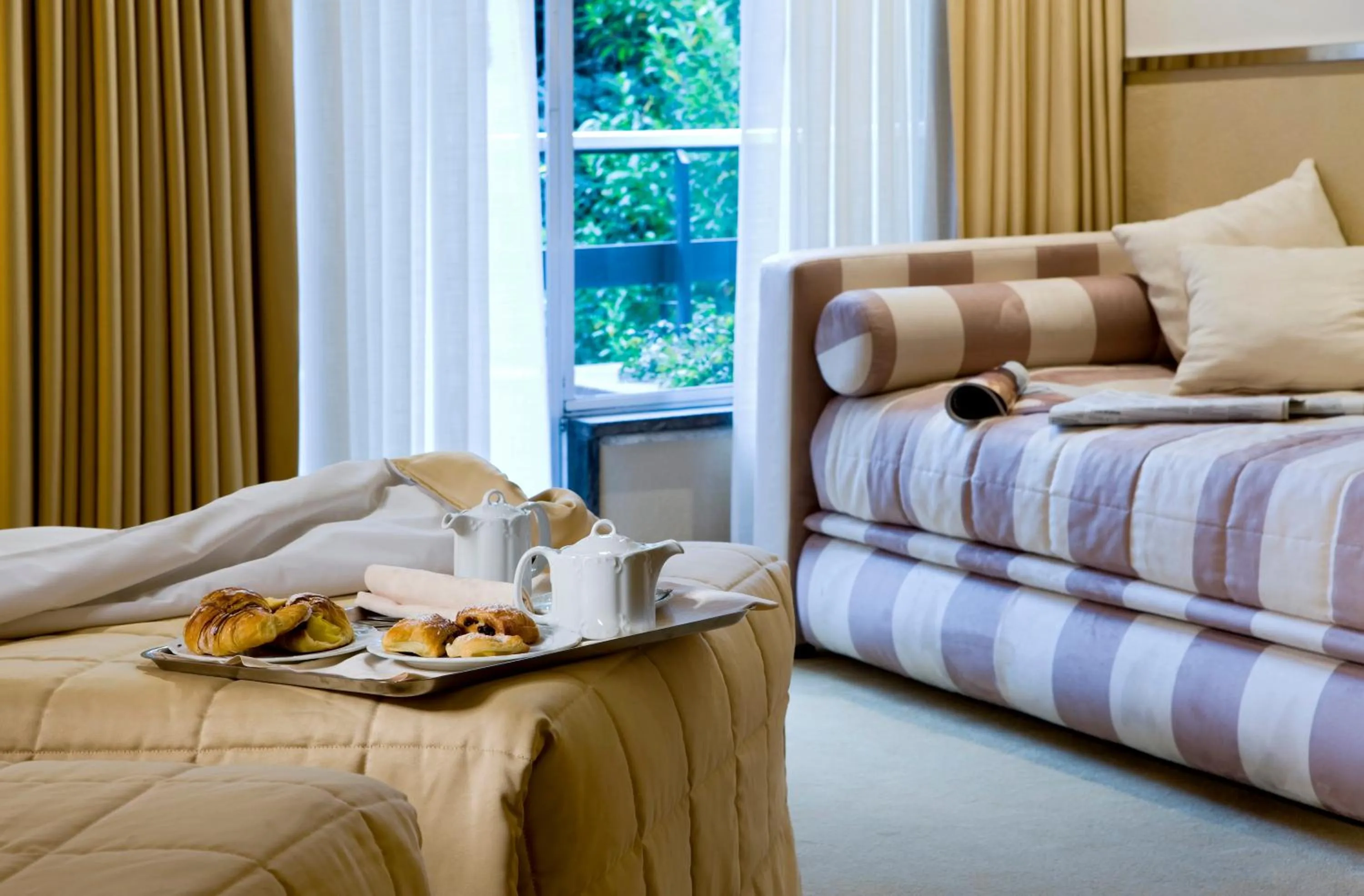 Bed in Mini Palace Hotel