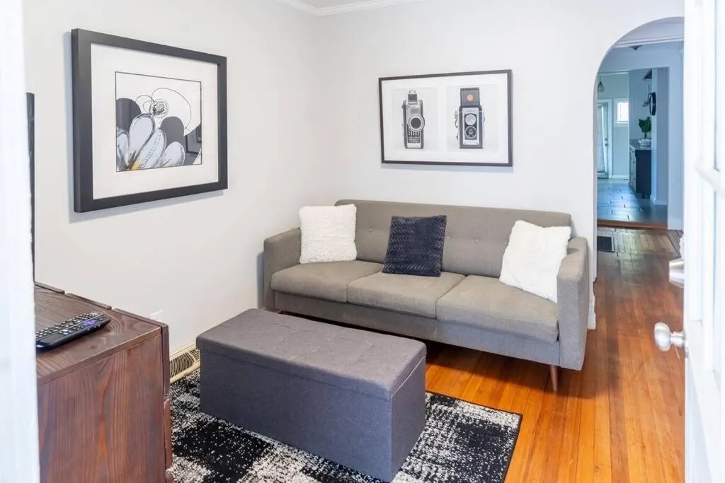 Living room in The Great Pink Lady with Huge Wrap Around Porch!
