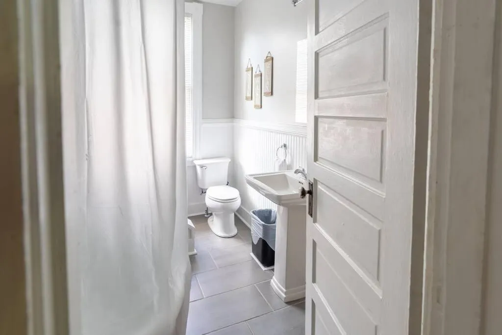 Toilet in The Great Pink Lady with Huge Wrap Around Porch!