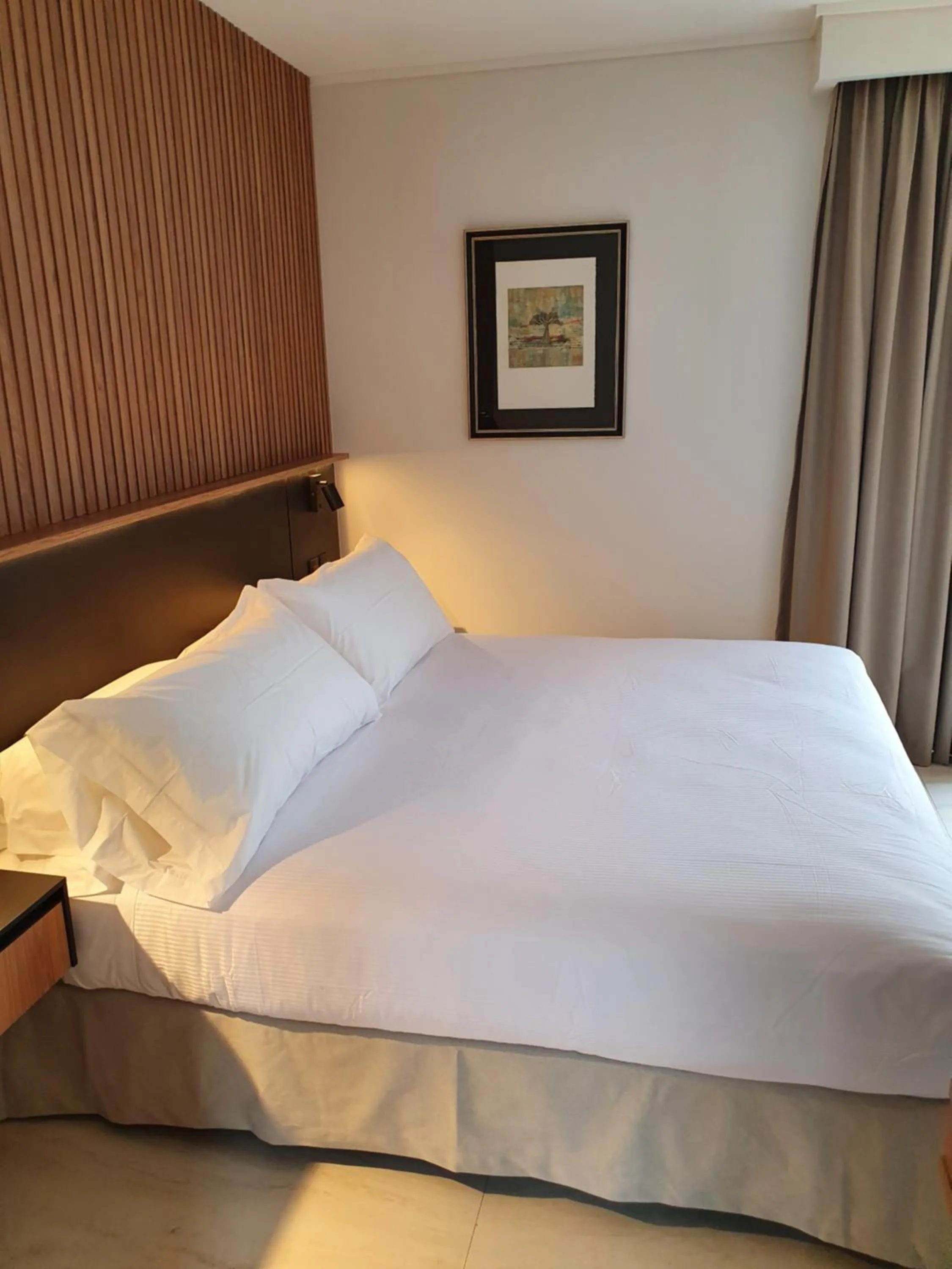 Bed in Lastarria Hotel