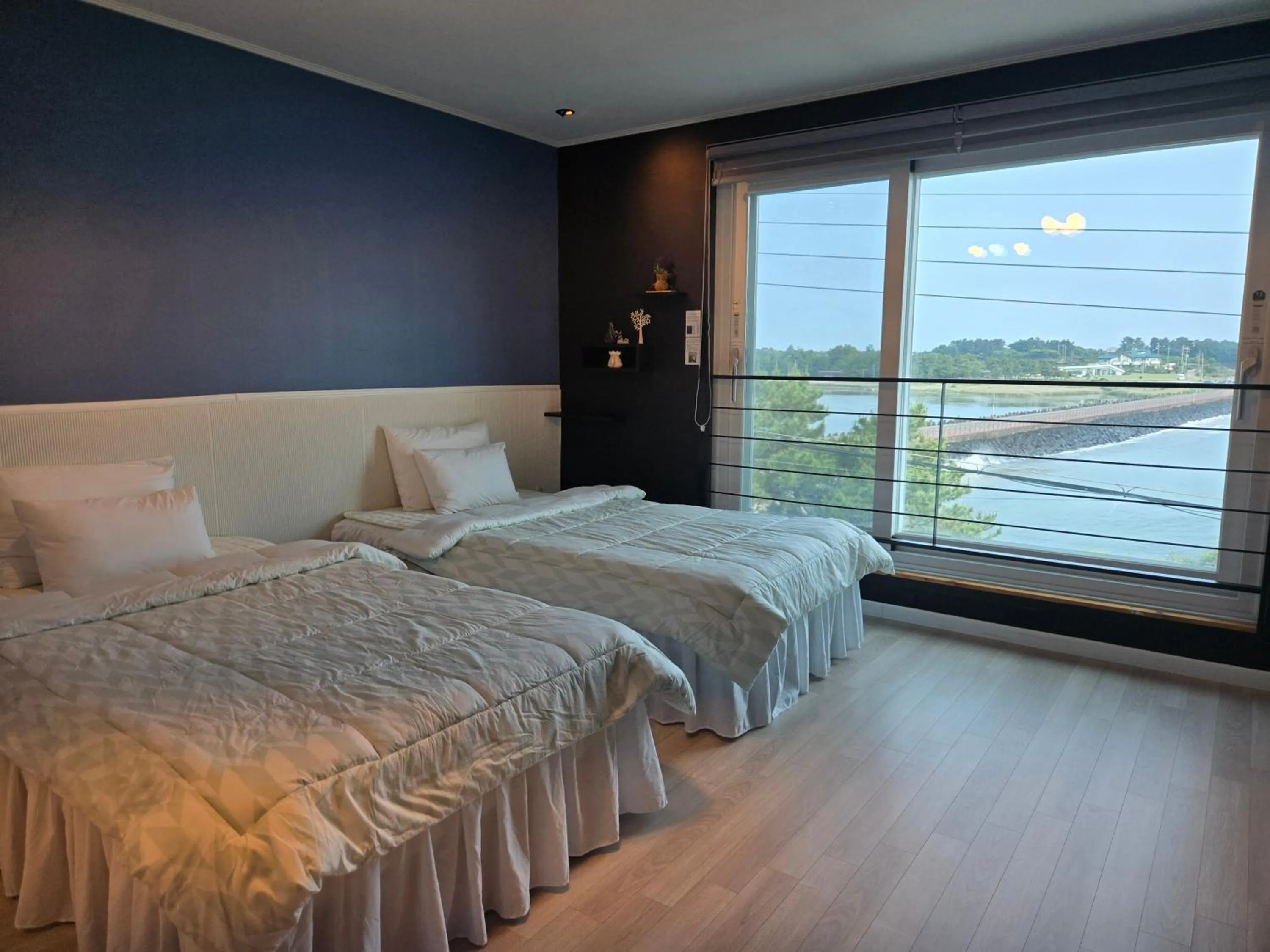 Bed in Jeju Gaviota Pension