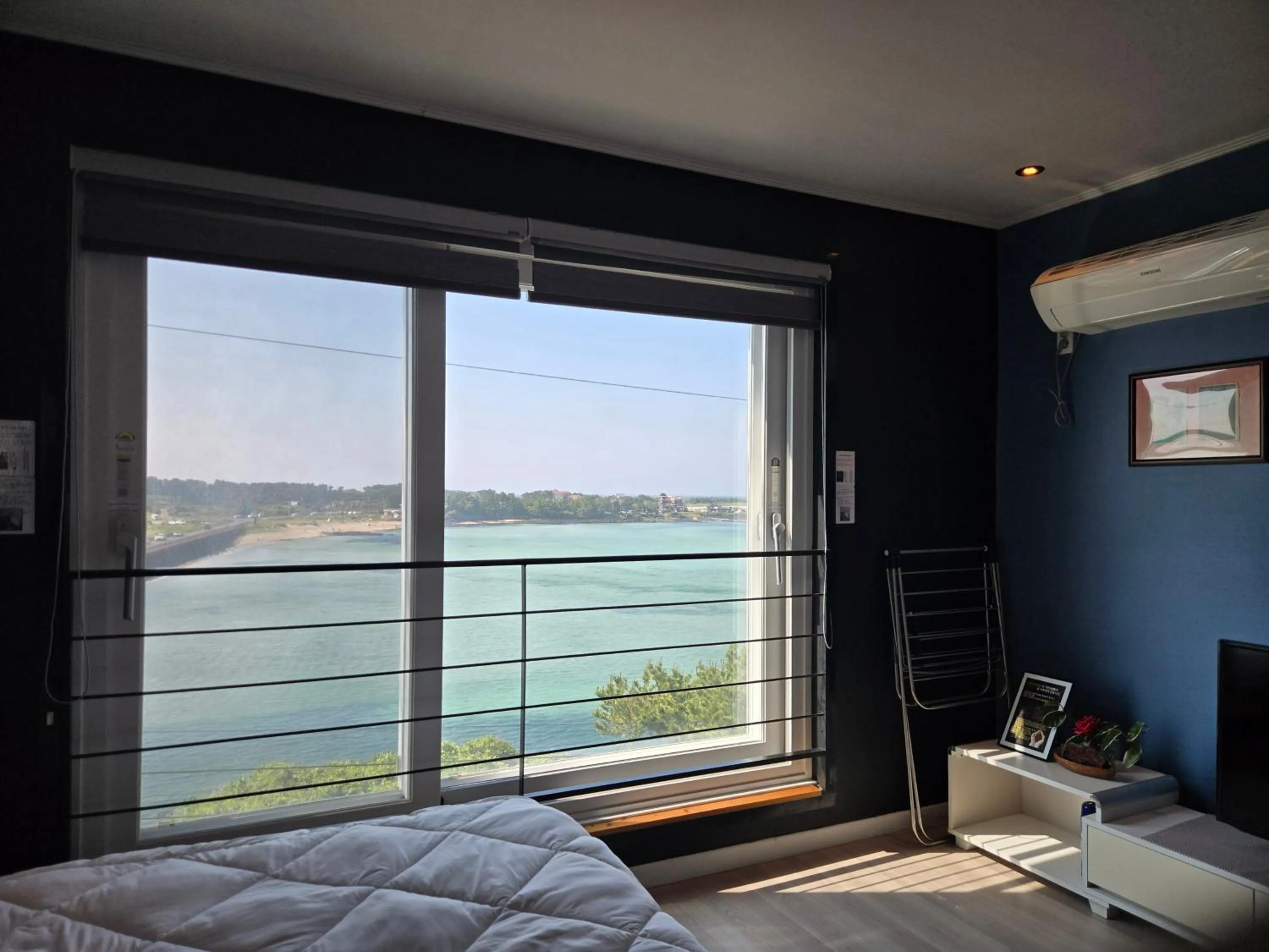 Bed in Jeju Gaviota Pension