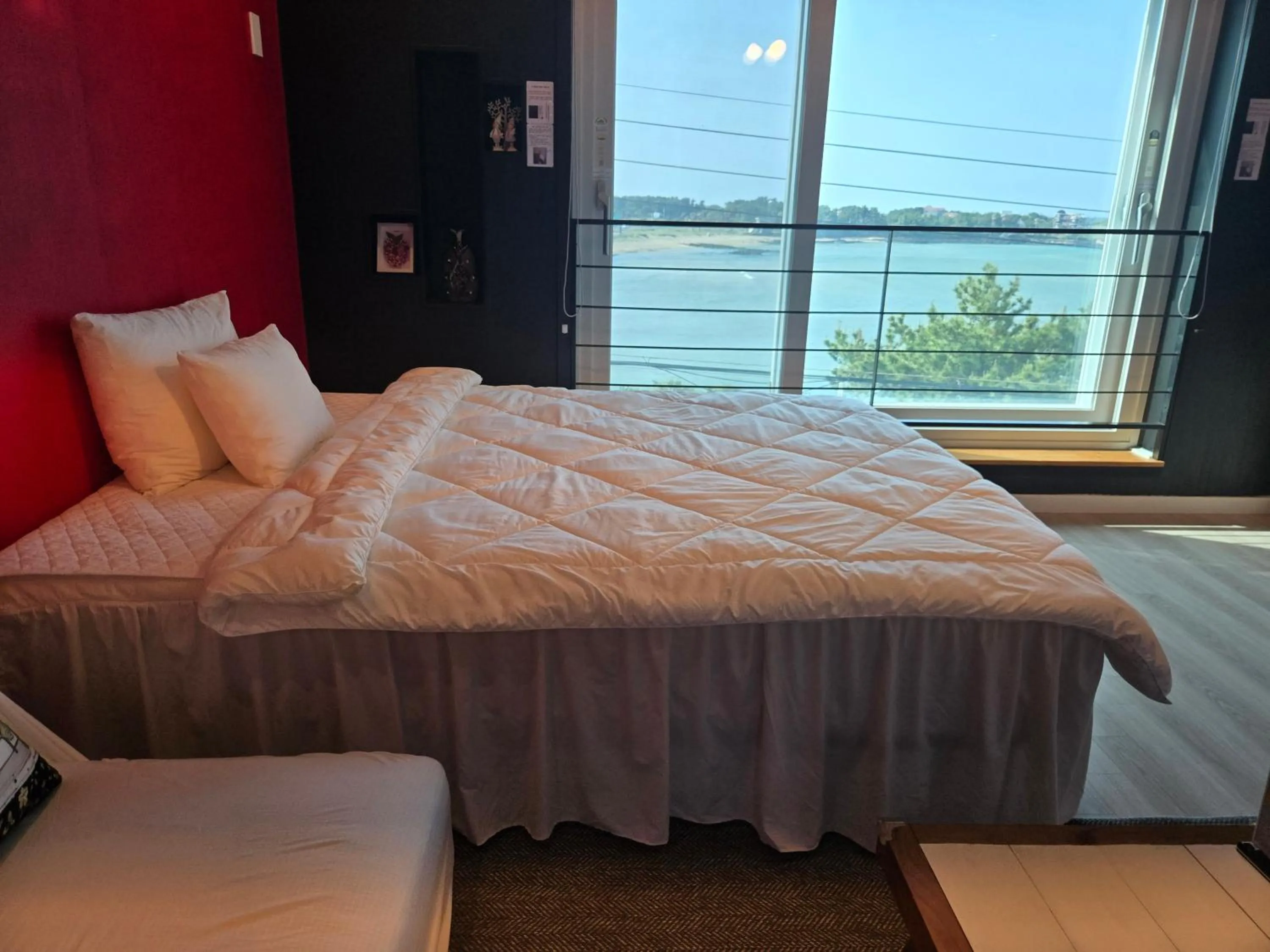 Bed in Jeju Gaviota Pension