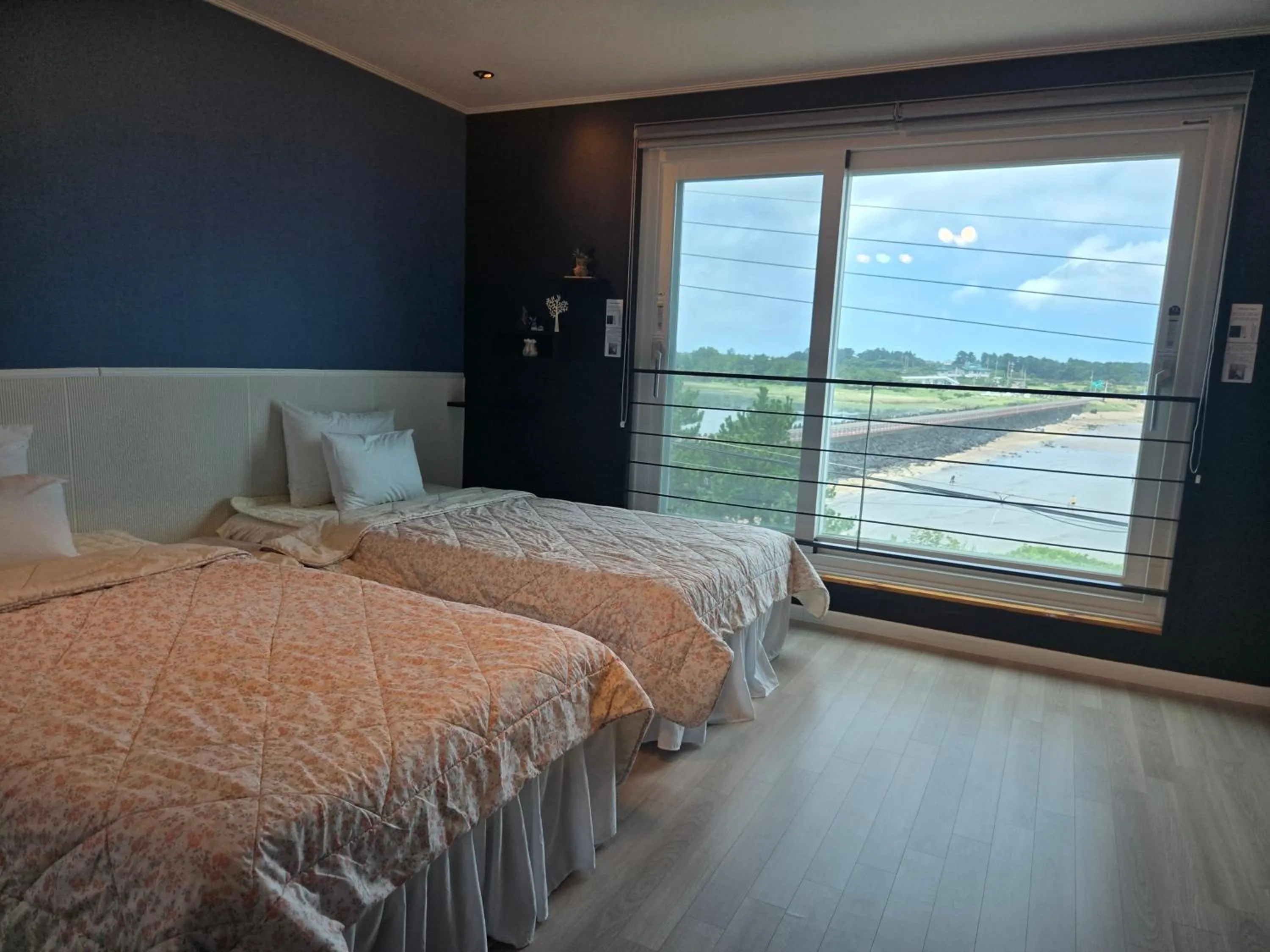 Bed in Jeju Gaviota Pension