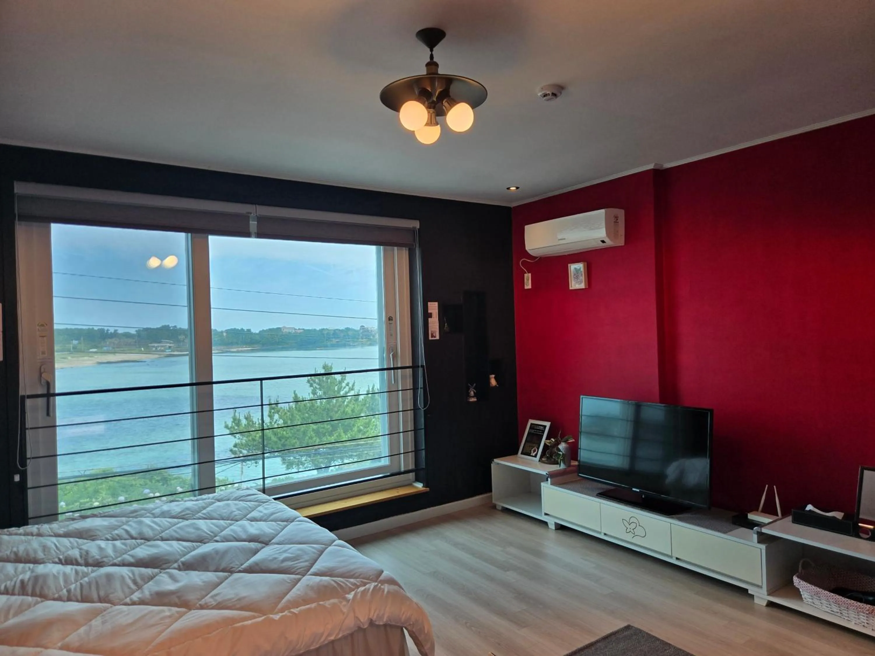 Bed in Jeju Gaviota Pension