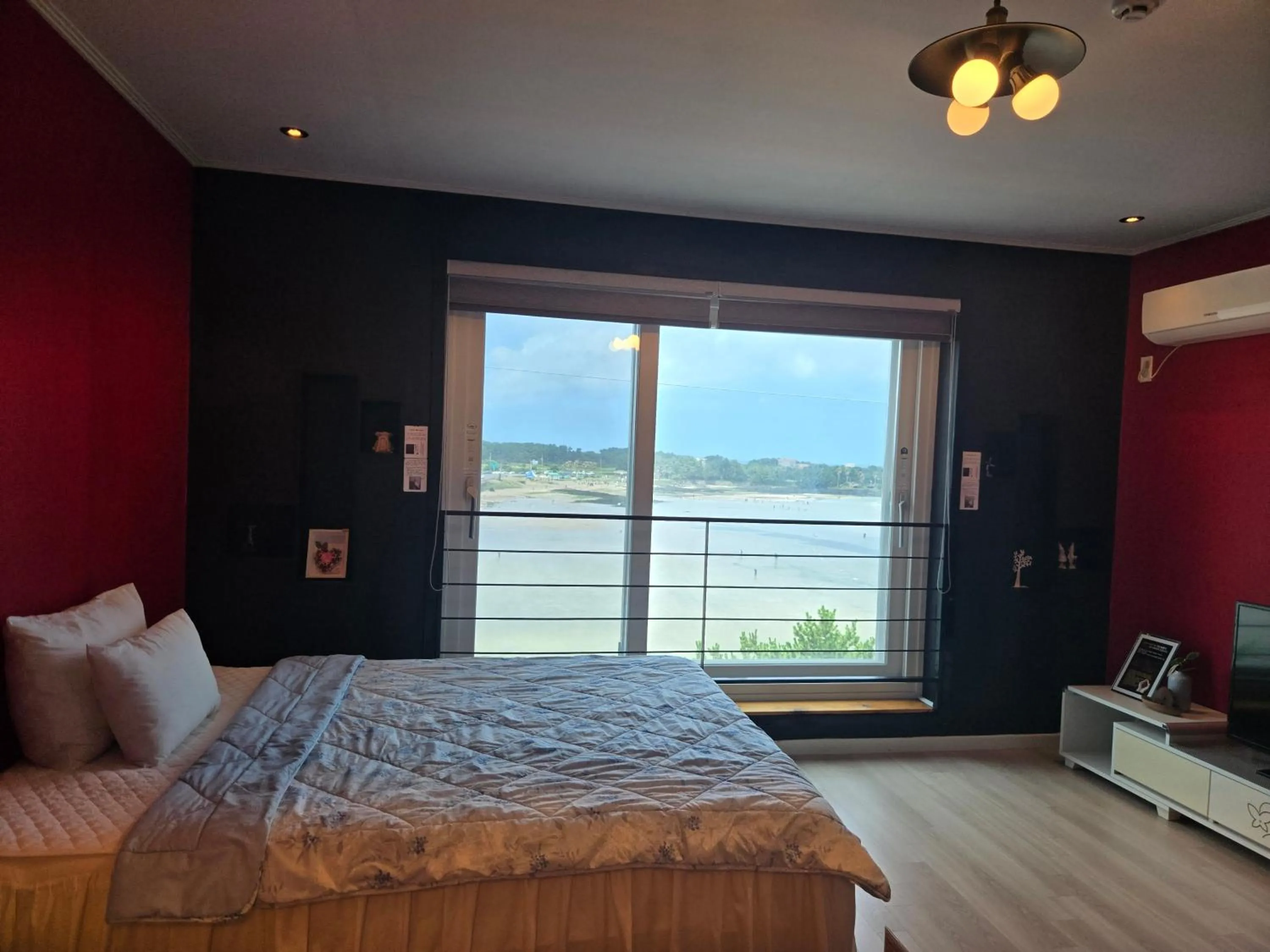 Bed in Jeju Gaviota Pension