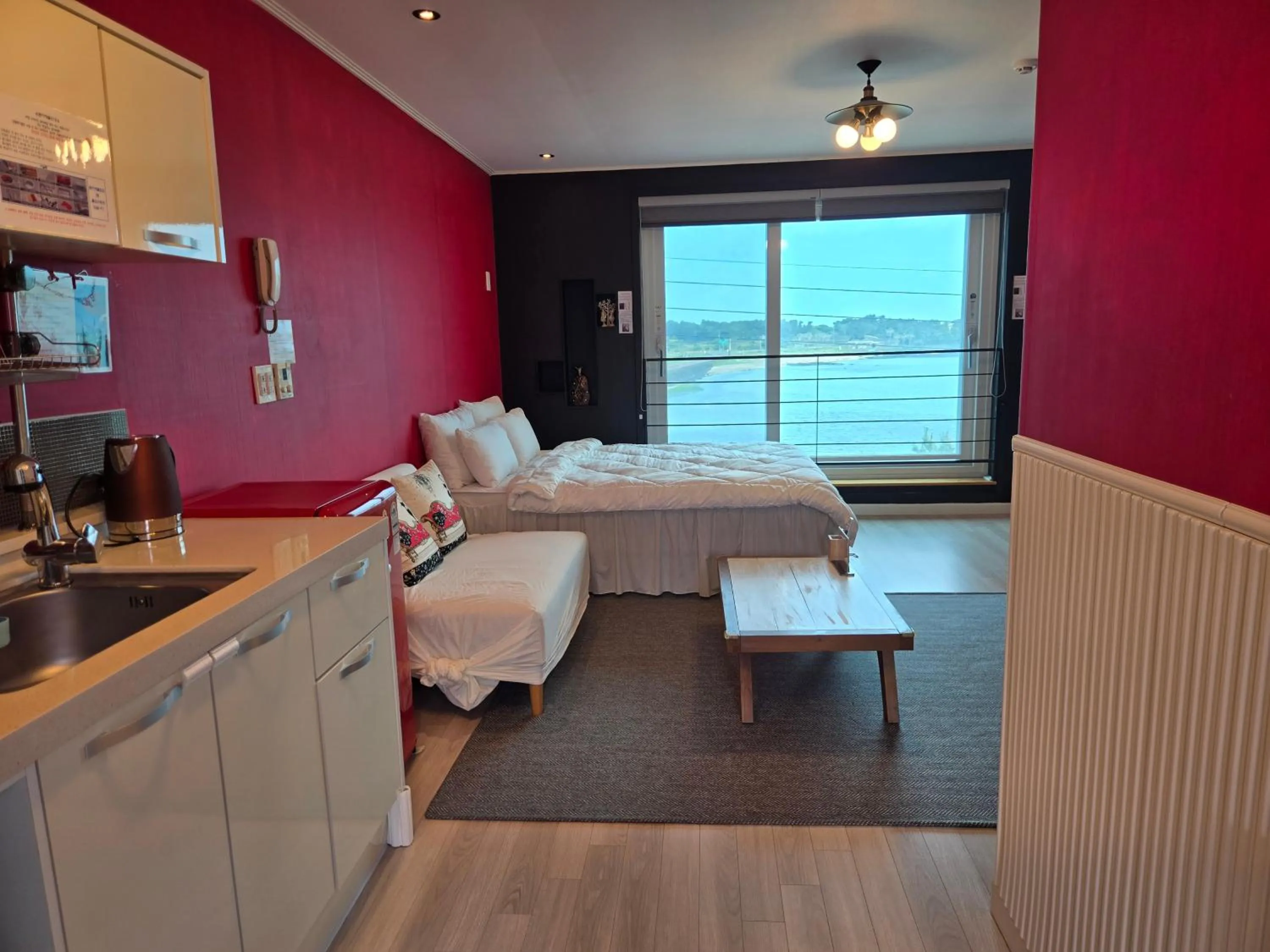 Bed in Jeju Gaviota Pension