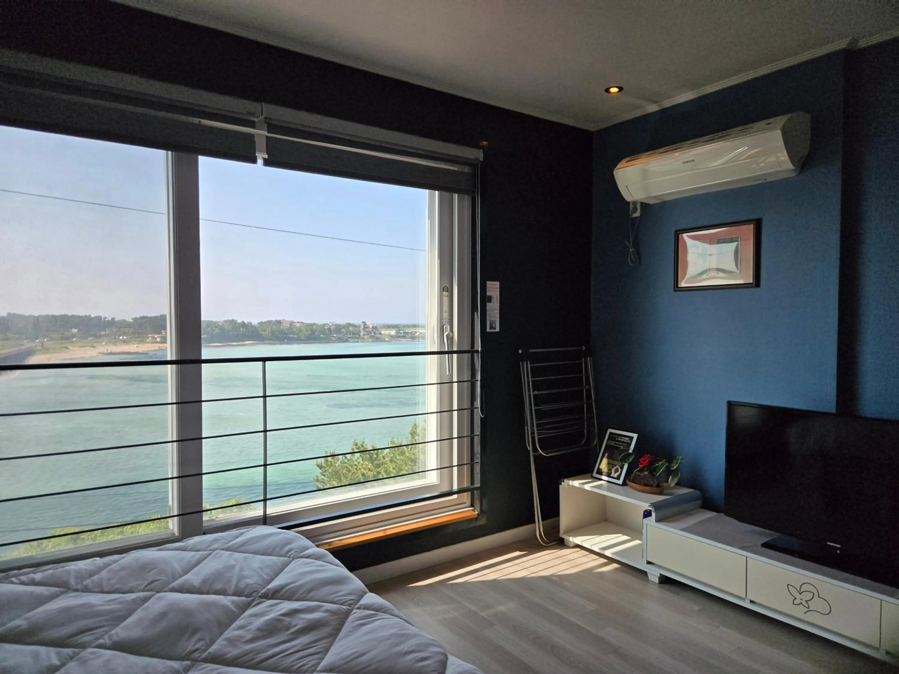 Bed in Jeju Gaviota Pension