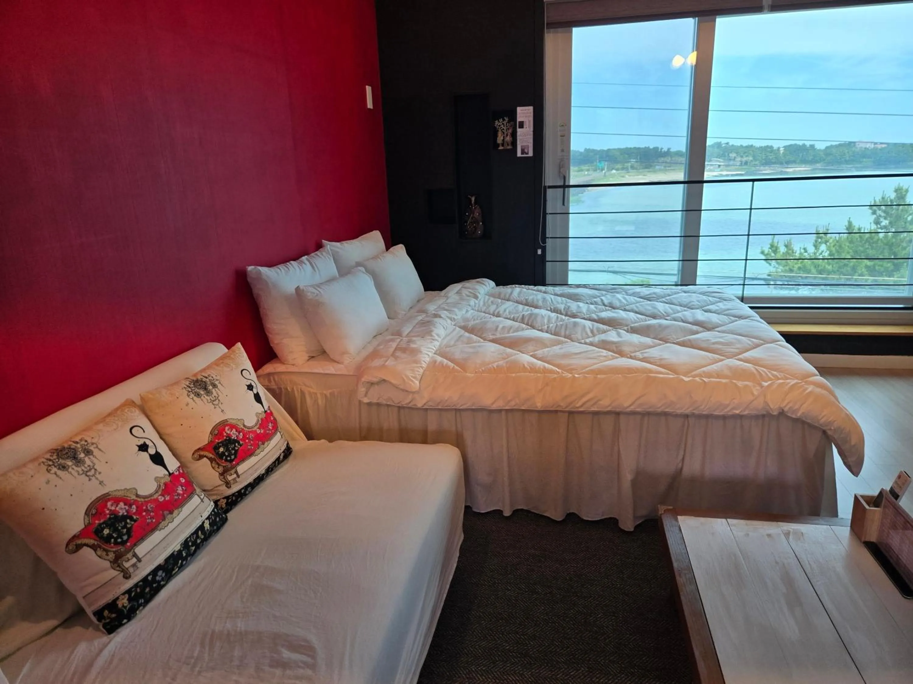 Bed in Jeju Gaviota Pension